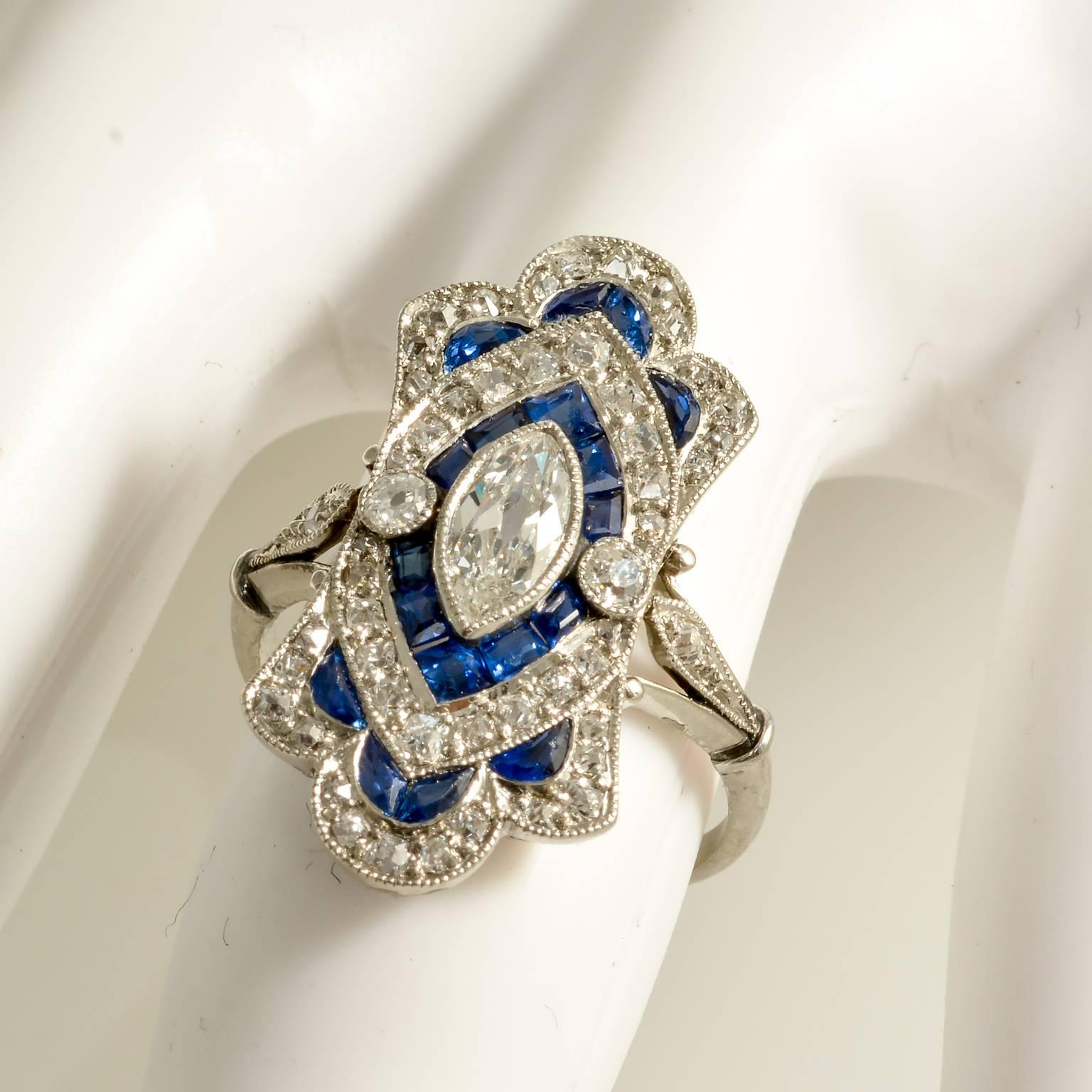 Art Deco Diamond and Calibre Sapphire Natural Marquese Platinum Ring, circa 1920 In Excellent Condition For Sale In London, GB