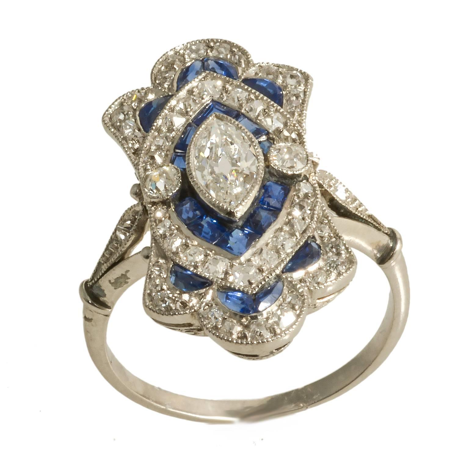 Women's Art Deco Diamond and Calibre Sapphire Natural Marquese Platinum Ring, circa 1920 For Sale