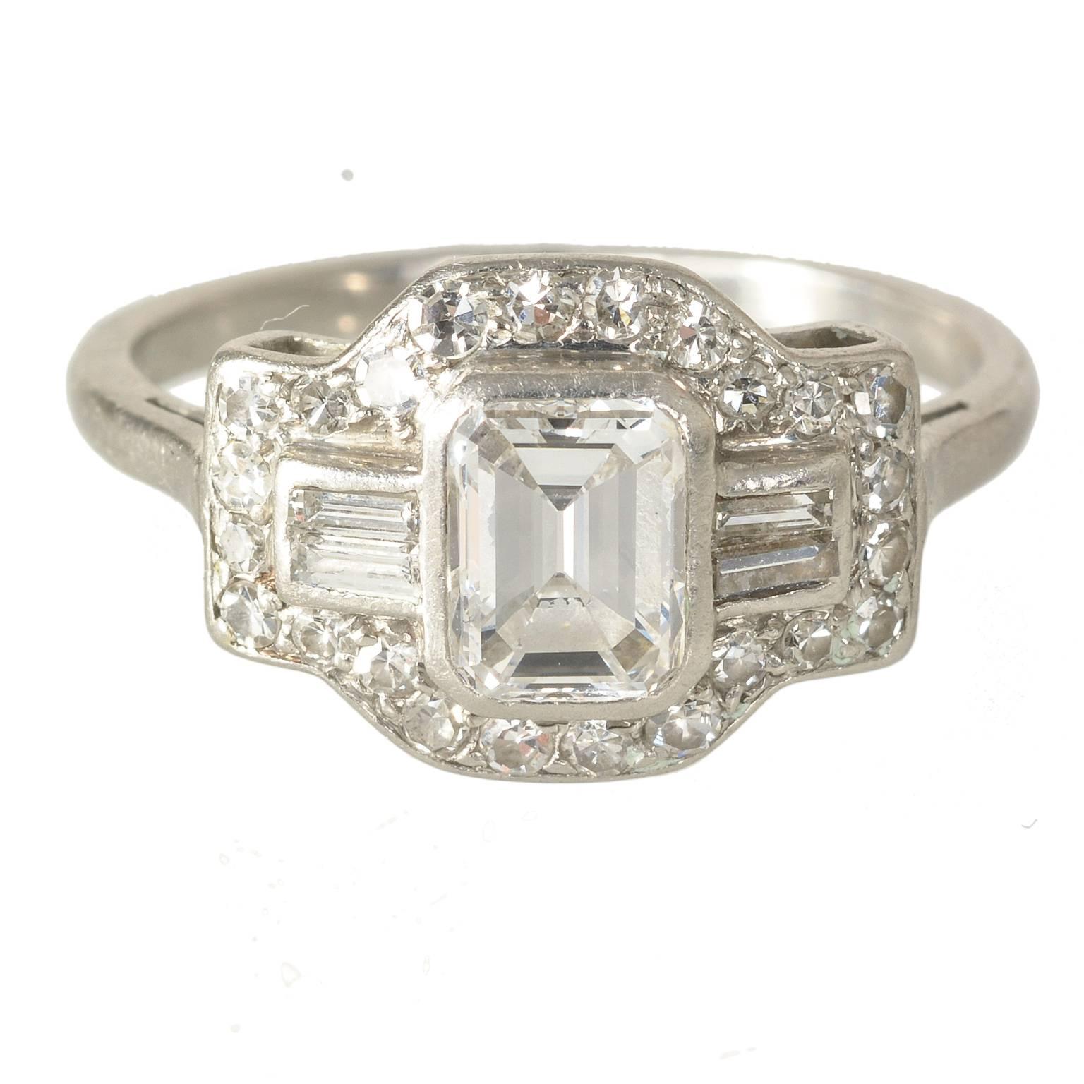 Art Deco Platinum Emerald Cut Diamond Baguette and Round Diamonds Ring For Sale