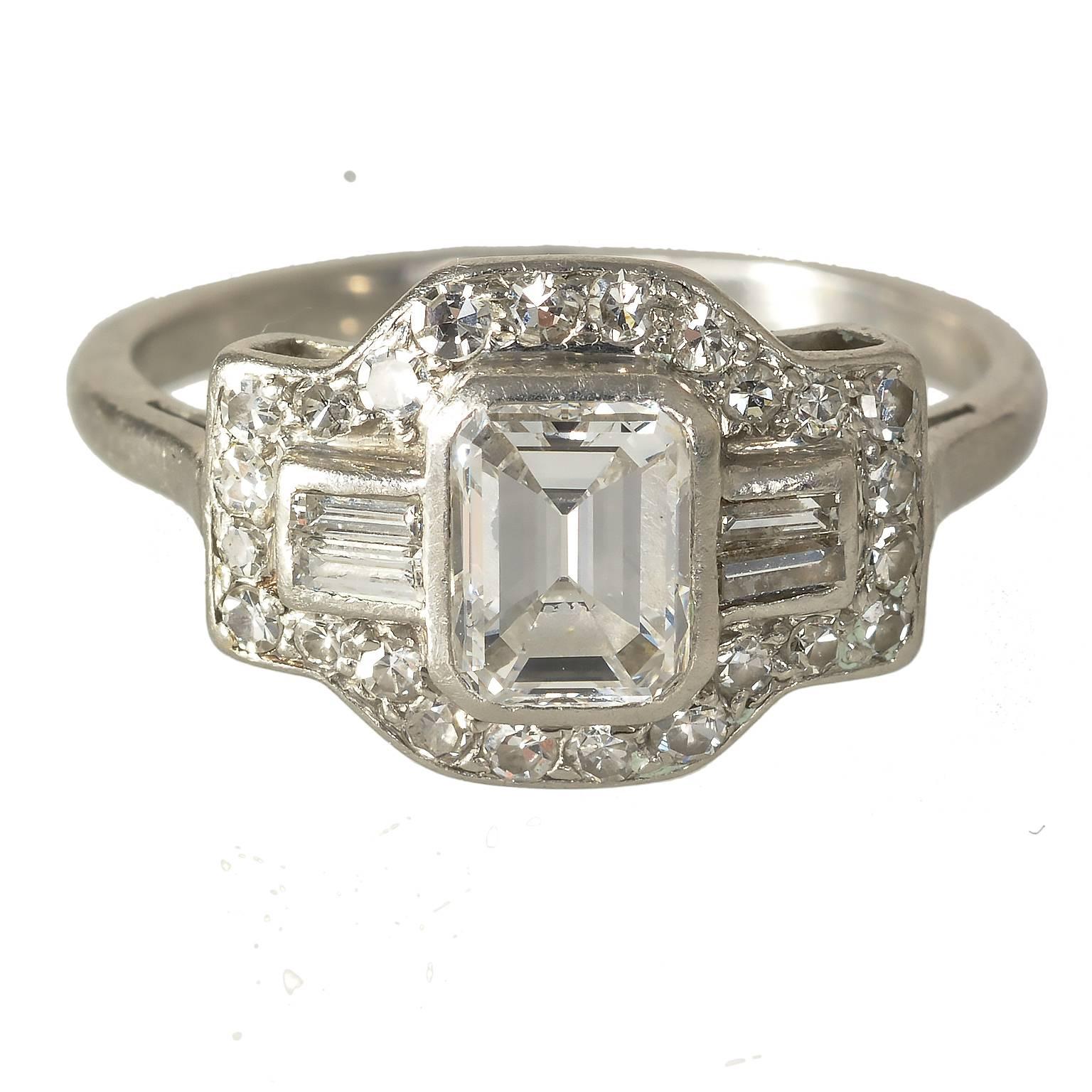 Art Deco Platinum Emerald Cut Diamond Baguette and Round Diamonds Ring For Sale 1