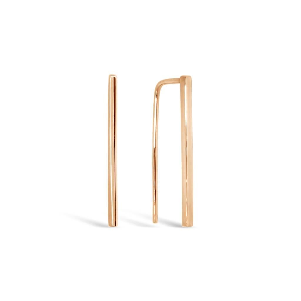 These minimalist, geometric earrings are sleek and easy to wear. The simple, beautiful design is very versatile, and can be dressed up or down. 

Length 25mm. 14 karat rose gold. Hook earrings for pierced ears.

These earrings can be customised with