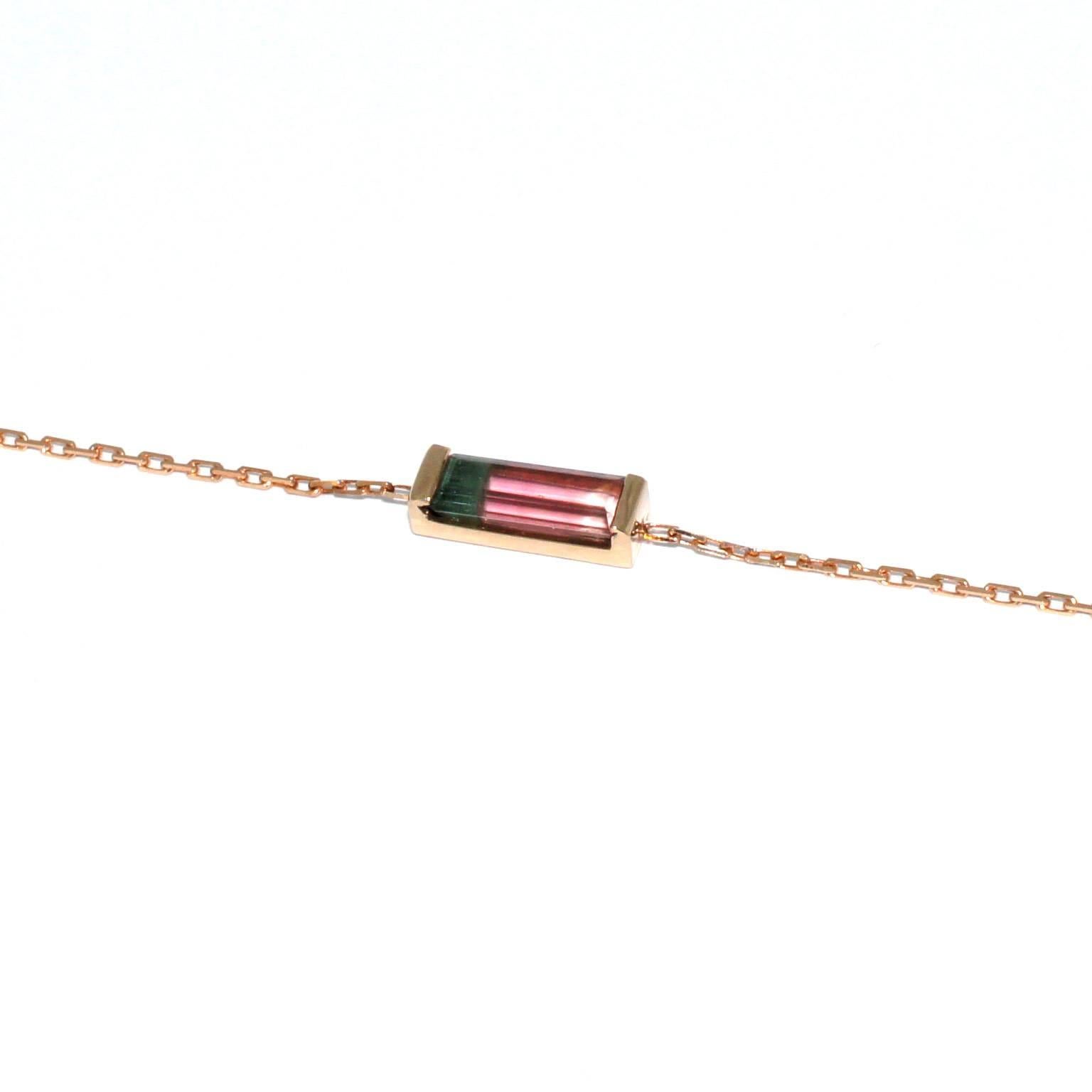 This simple and timeless chain bracelet is handmade in Sydney in 18k rose gold and set with a pretty baguette-cut bi-colour 1.76ct tourmaline. Easy to wear and versatile. 

Chain bracelet with a boltring clasp.
Overall length: 17.8cm/7 inches (can