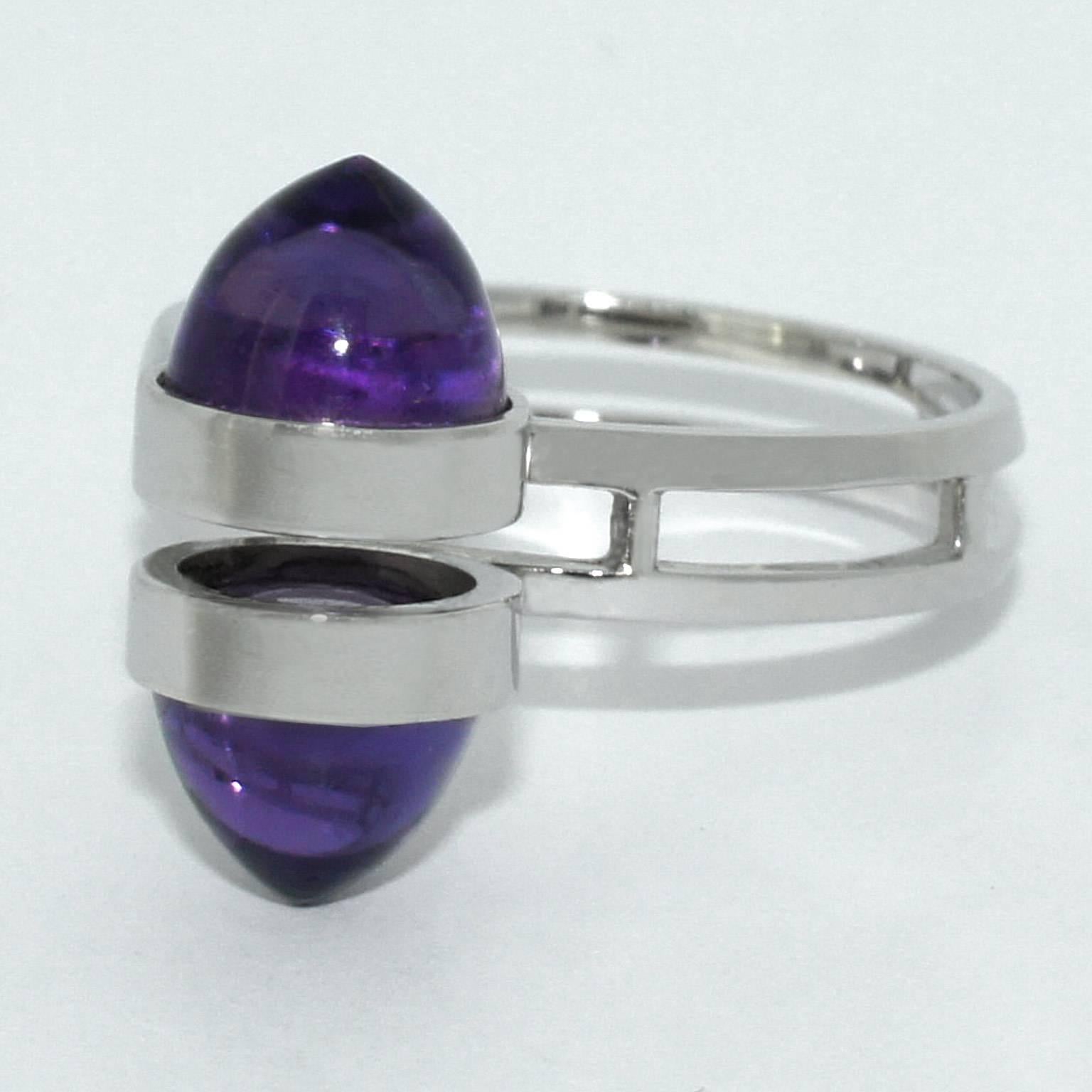 Crafted in Sydney, in 9 karat white gold, this striking contemporary ring features two beautiful royal purple Brazilian amethysts, set atop a double band in a tandem formation.

Ring size M 1/2 (UK/Australian), 6 1/2 (US), 53 (European).