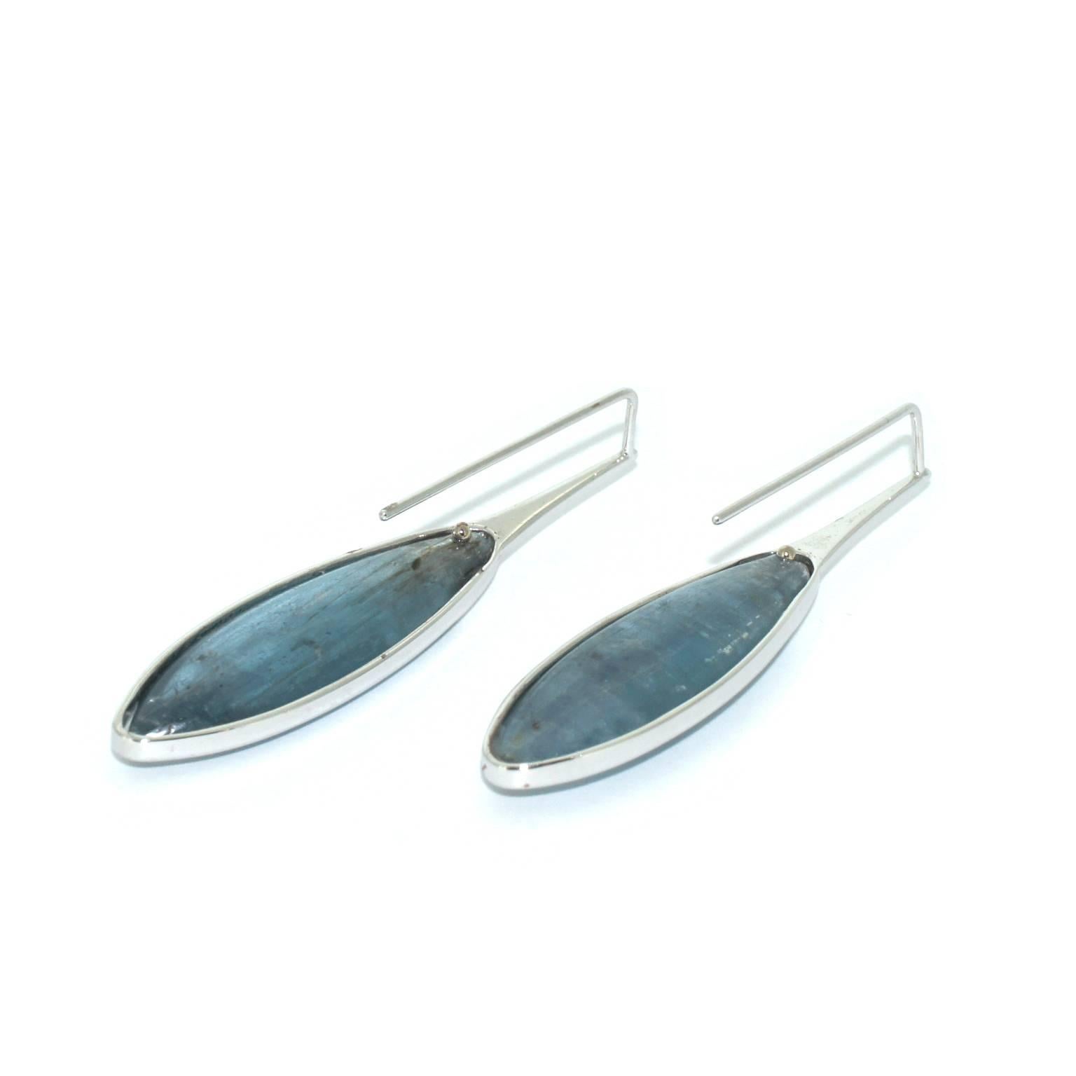 Kyanite gemstones are the star of these elegant and unusual earrings. This beautiful gem is said to have a calming effect and assist communication. Resembling deep pools of water, these beautiful stones are set in 9 karat white gold.

Earrings for