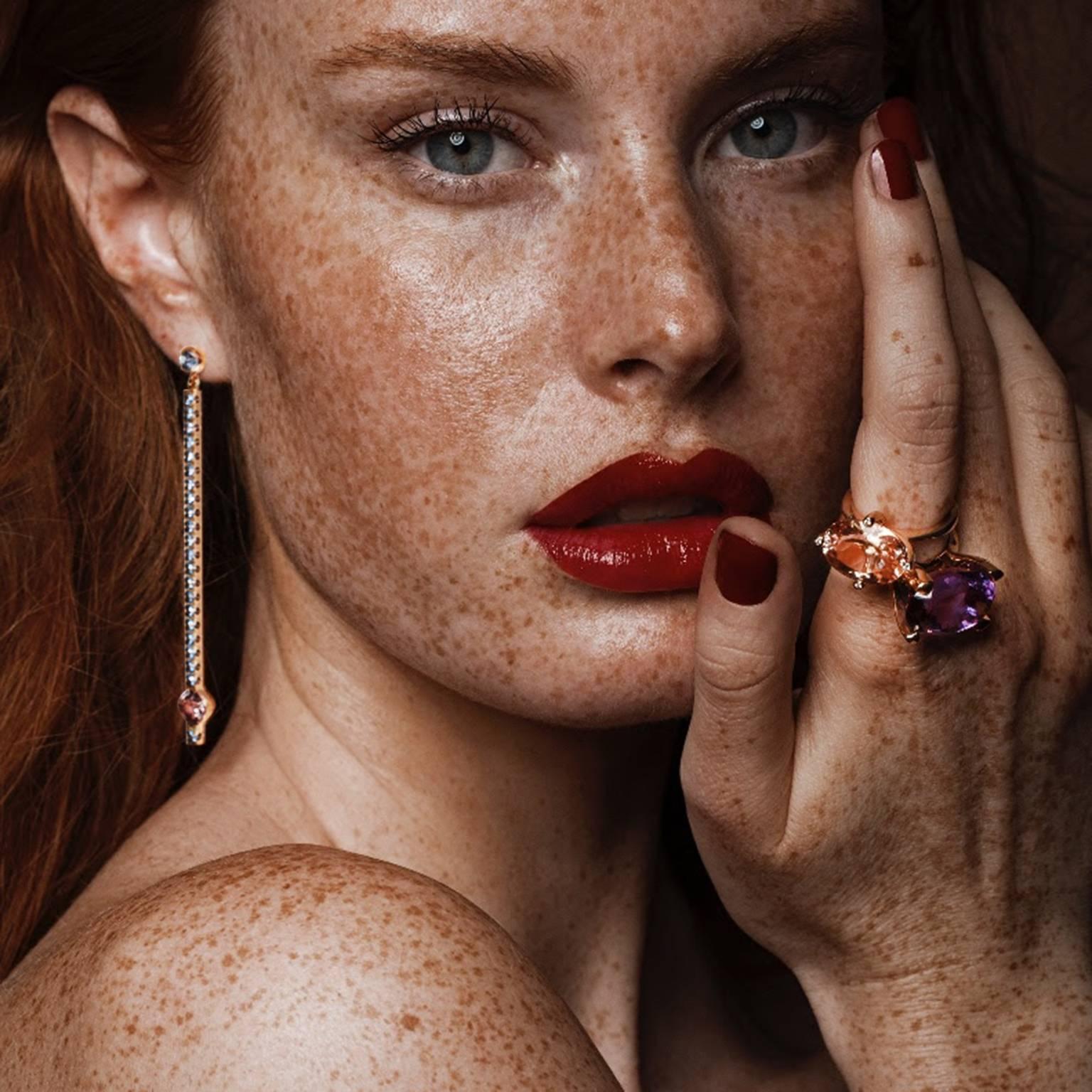 These show-stopping drop earrings are pure glamour. These spectacular earrings, set with blue sapphires and colour-shift pink-peach Malaya garnets, are red carpet worthy. Handmade in our Sydney studios in 18k rose gold, these exceptional earrings
