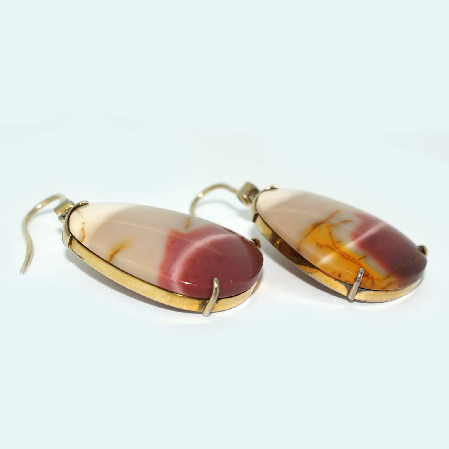 These one-of-a-kind earrings are handmade in Sydney in gold plated sterling silver and feature a pair of unique Australian Jasper gems and a pair of round brilliant cut champagne diamonds. Jasper is a form of Chalcedony, and this particular type of