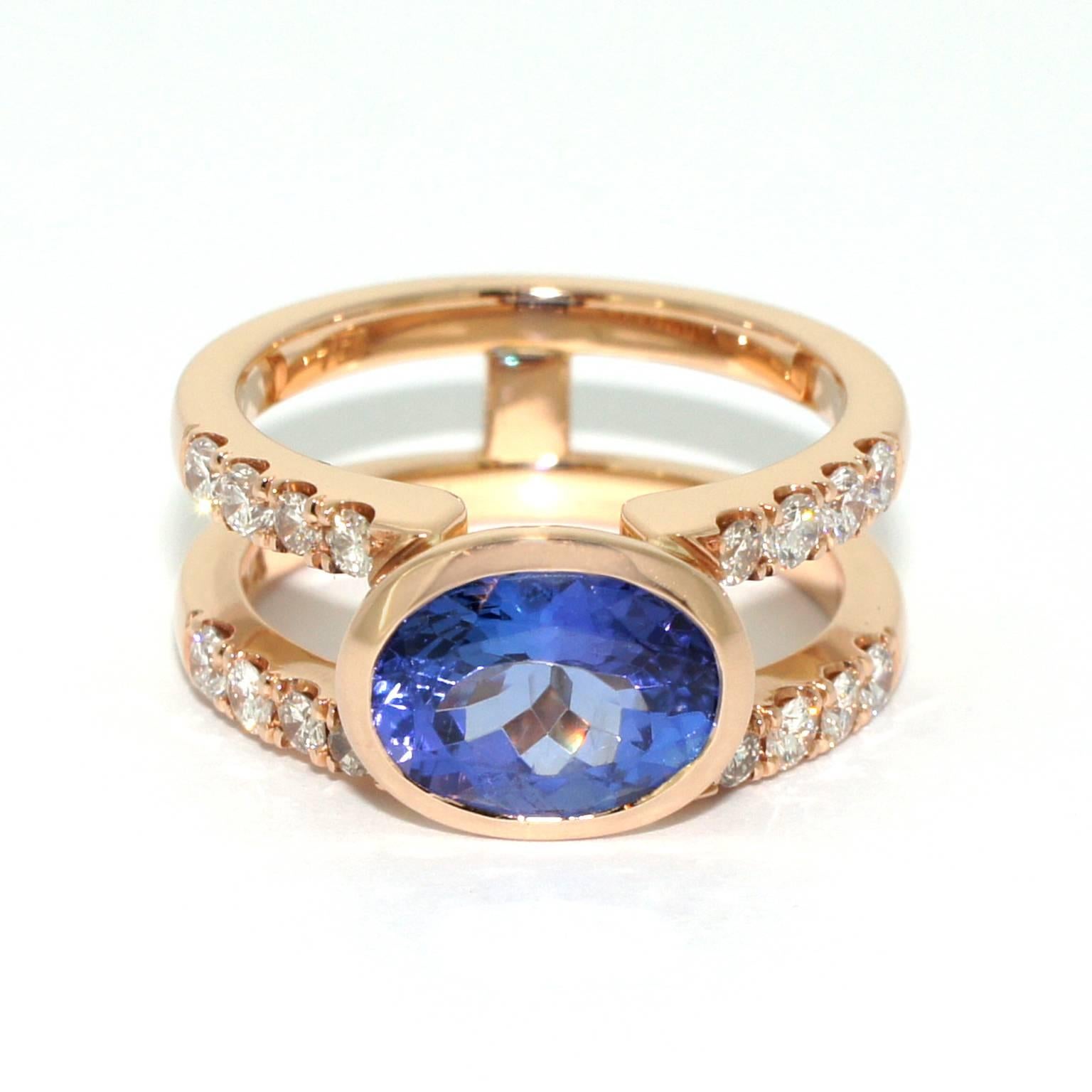 This gorgeous double band ring is handmade to order in our Sydney studios in 18 karat rose gold. Set with a beautiful, saturated purple-blue 5-carat tanzanite and 0.42 carat of F VS diamonds, this ring is a timeless contemporary heirloom.

This ring