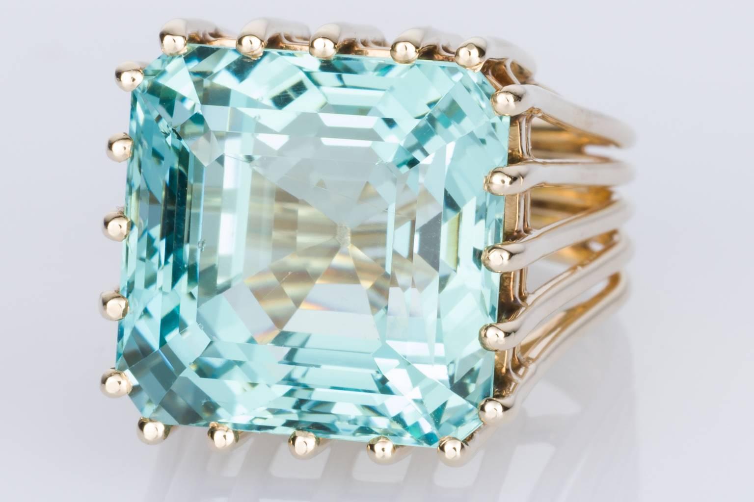 Have you ever seen an Aquamarine so beautiful? It's rare to find one that has such extraordinary colour with slight tones of green as well as a light sea blue. The setting showcases this amazing gemstone to its full beauty revealing all its faceting