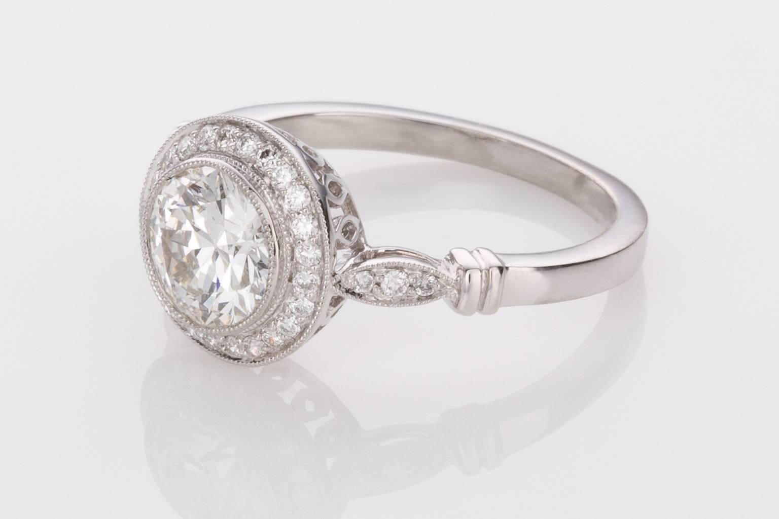 A perfect ring for that special lady, especially if she loves the timeless style of a Halo engagement ring.  The central diamond is a 1.22ct old European cut H/I colour, VS clarity surrounded by 0.19cts of sparkling diamonds forming a halo with