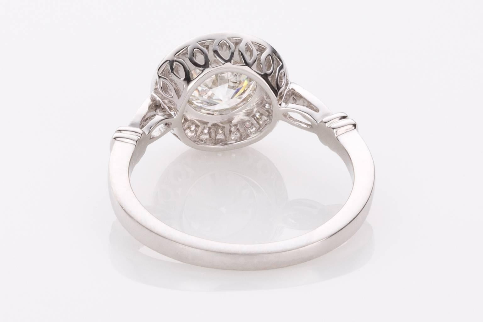 Women's 1.22 Carat Old European Cut Diamond Halo Platinum Engagement Ring For Sale