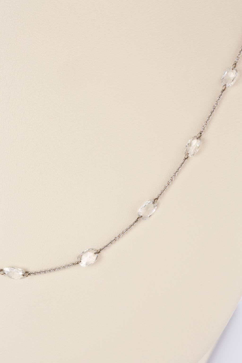 This necklace is so pretty and delicate, it's incredibly hard to photograph how gorgeous it is. Oval faceted white diamonds weighing 3.74cts are drilled at each end to join a fine 18k white gold link chain. It's understated, elegant and so wearable,