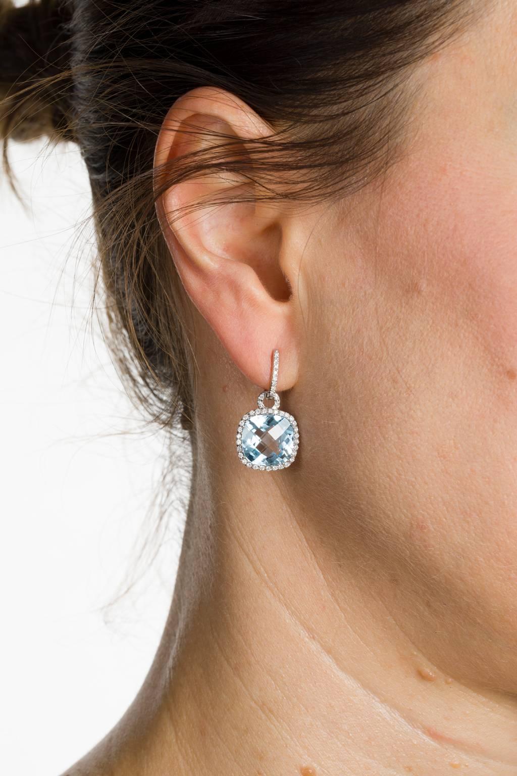 Contemporary Blue Topaz and Diamond 18 Karat White Gold Halo Style Drop Earrings