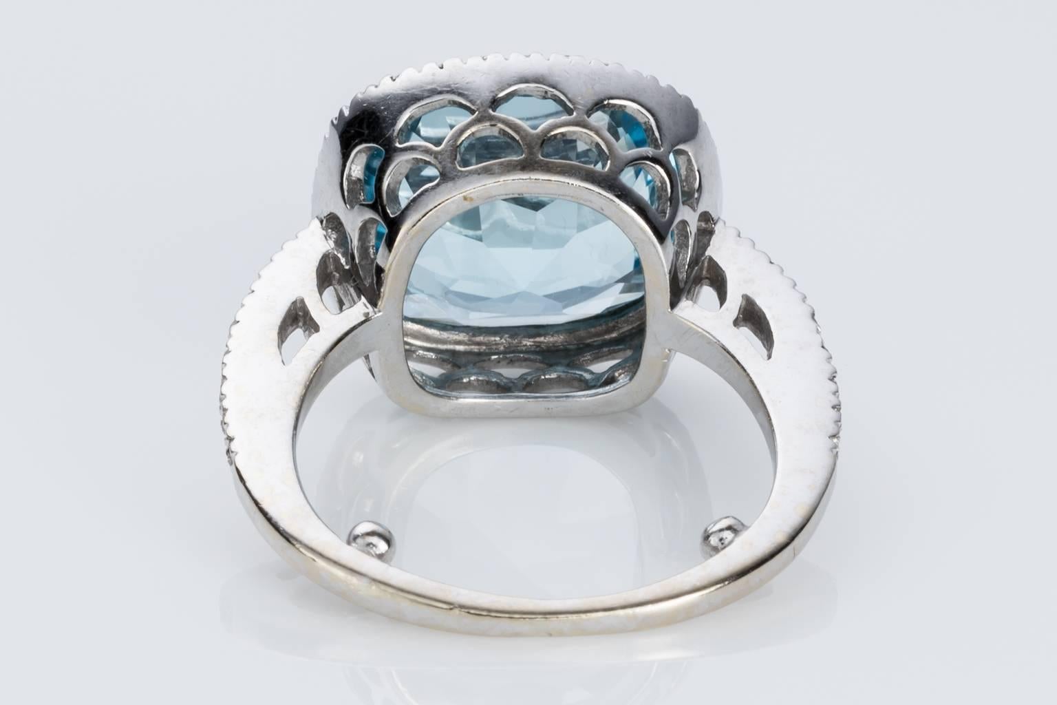 Blue Topaz and Diamond 18 carat White Gold Halo Style Dress Ring 1