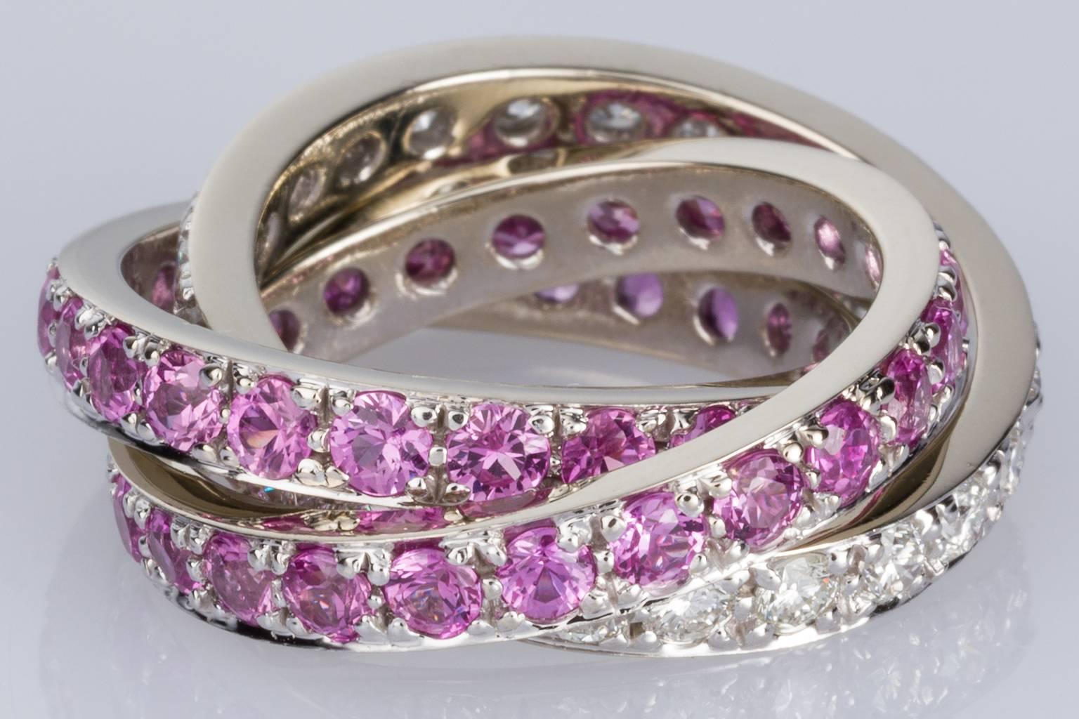 Contemporary Pink Sapphire and 1.32 carat White Diamond Three-Band Ring