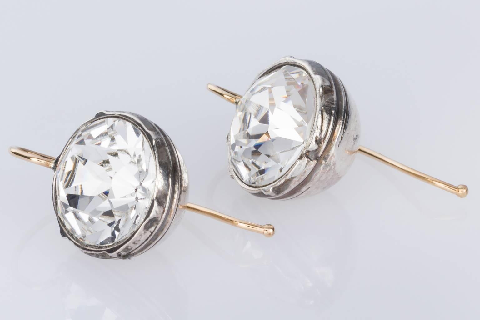 These fabulous paste earrings will turn heads. They are so sparkly and they look just like old-cut diamonds.
Vintage paste set in sterling silver cups and 14k yellow gold ear wires, these earrings are so simple to wear. They are easy to put in and