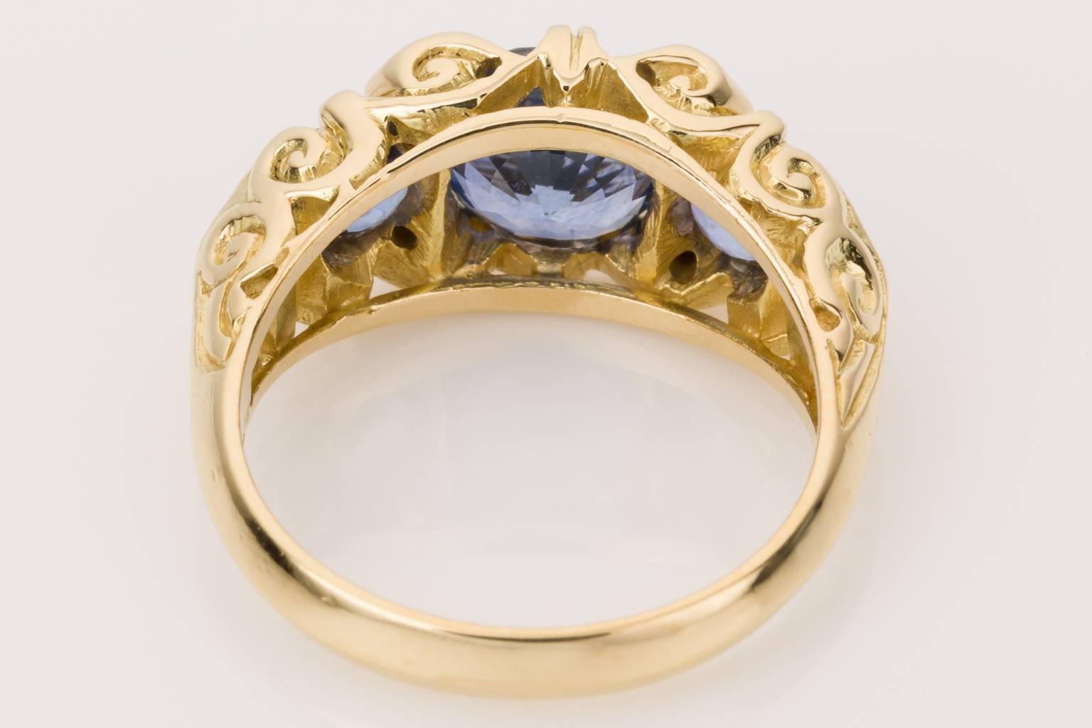 Round Cut Ceylon Sapphire and Diamond Three-Stone Ring