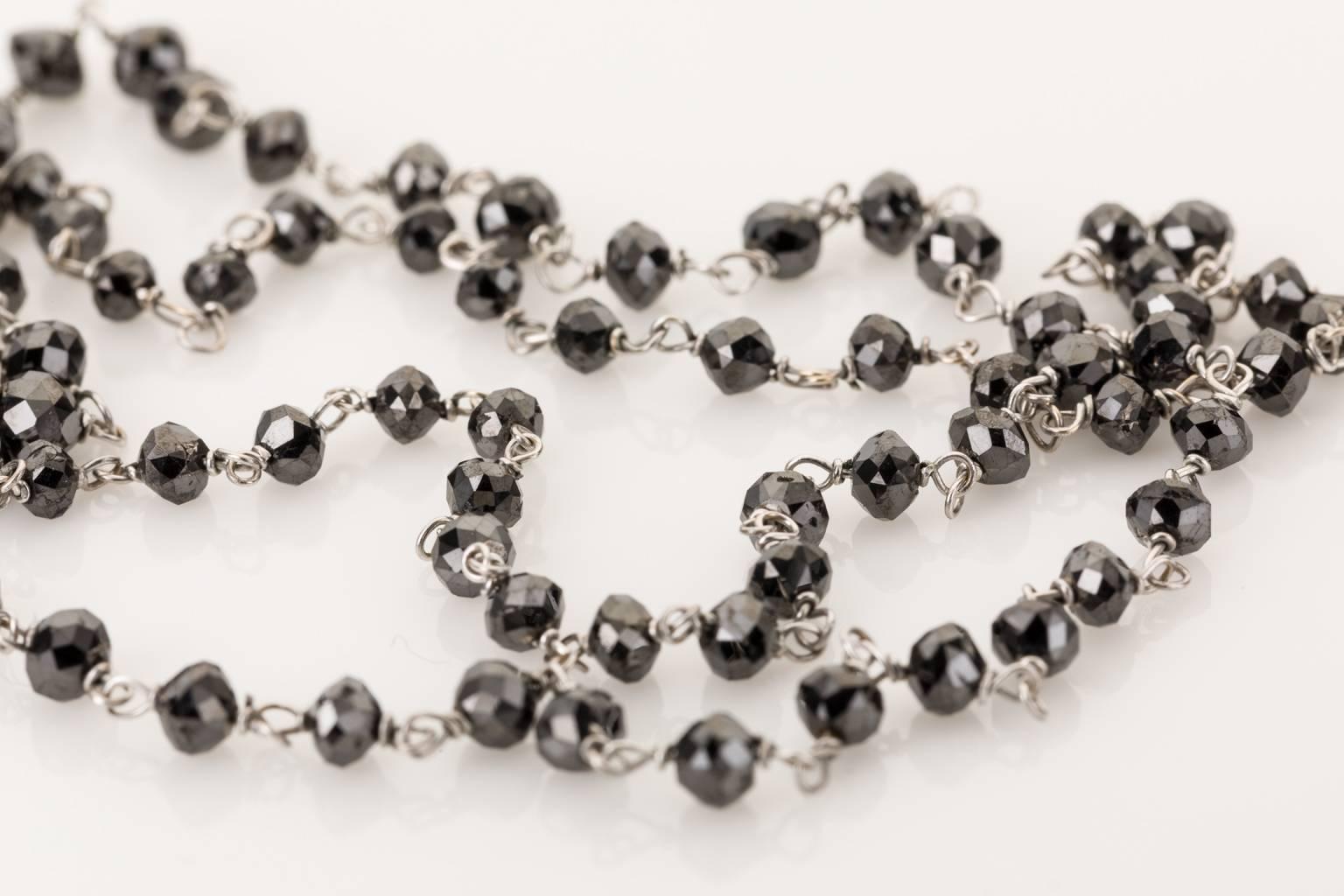 Black Diamonds have a magical look to them. Since diamond is the hardest substance known to man these gems can take an extremely high polish so they have so much sparkle and life to them. This handmade black diamond necklace features 15.12cts of