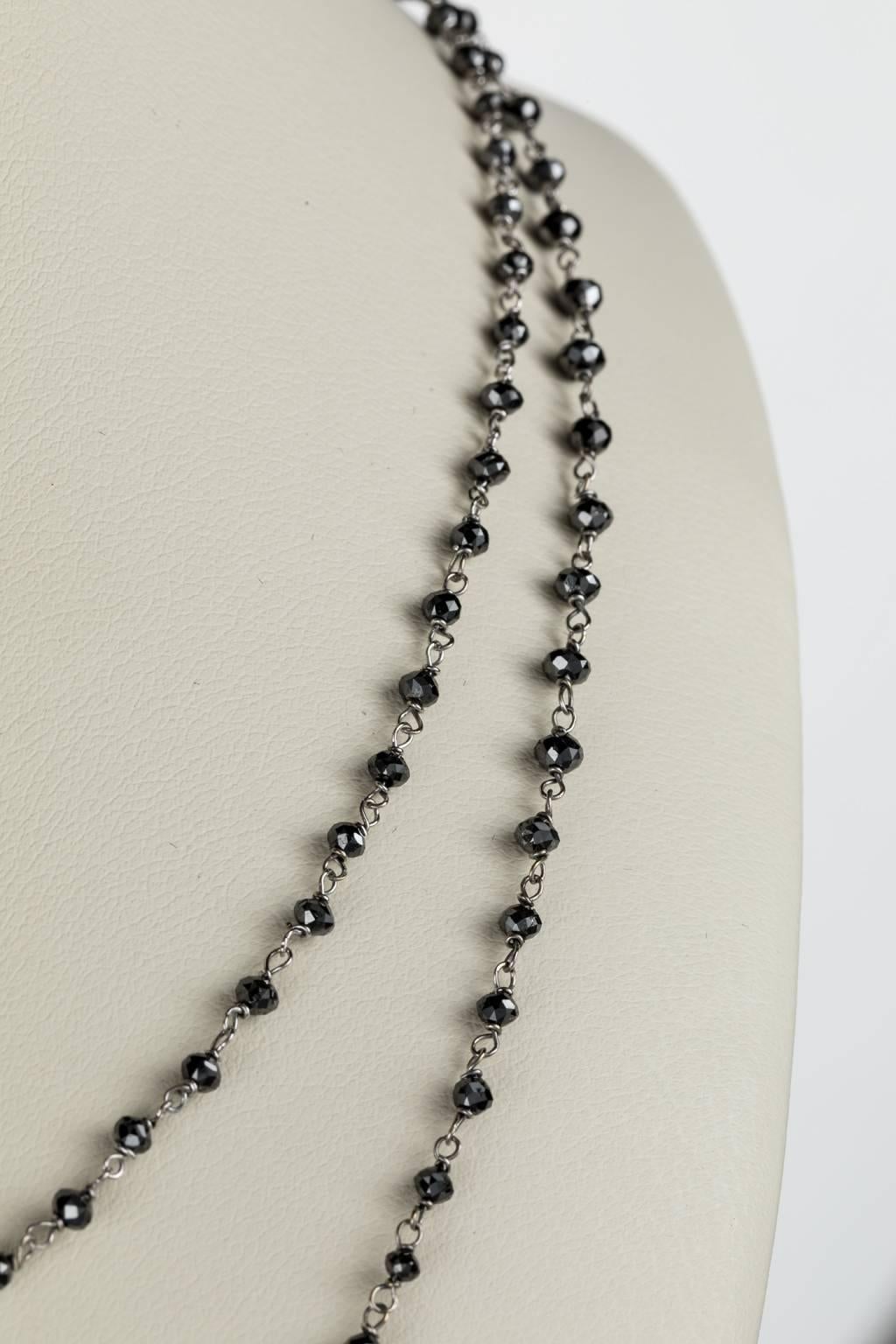 Black Diamonds have a magical look to them. Since diamond is the hardest substance known to man these gems can take an extremely high polish so they have so much sparkle and life. This handmade black diamond necklace features 19.22cts of faceted