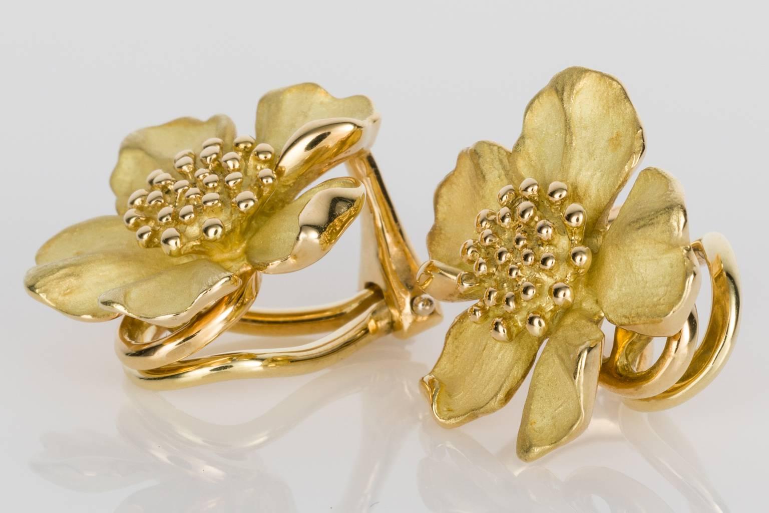 Playful yet sophisticated, these 18k yellow gold Tiffany & Co Wild Rose earrings are just so cute. The gold textured flower heads are a mixture of a matte finish gold with the edges of the petals in a high polish gold. The central stamen gold balls