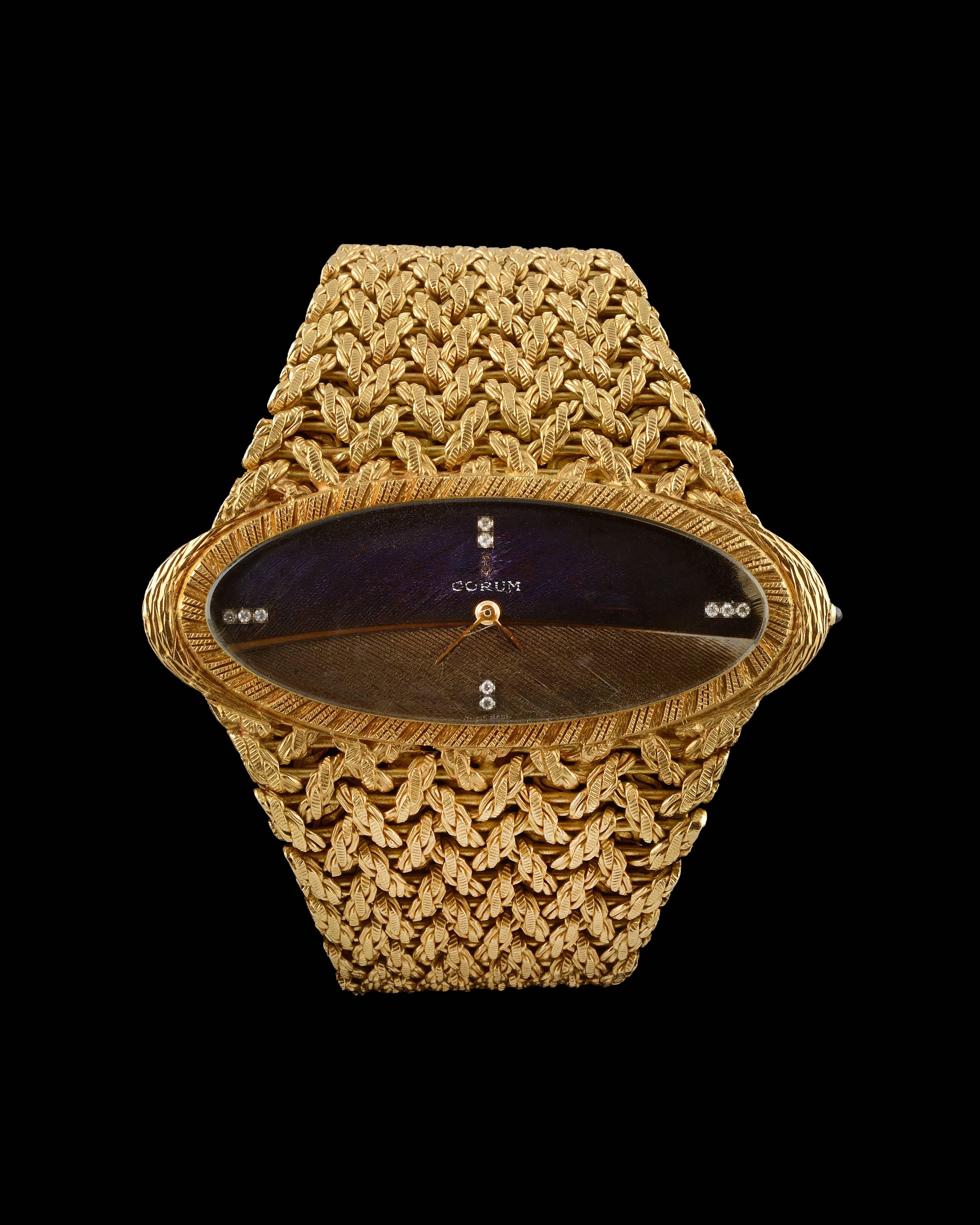Corum Watch in Yellow Gold Peacock Feather, Diamonds & Sapphire. Circa 1970.