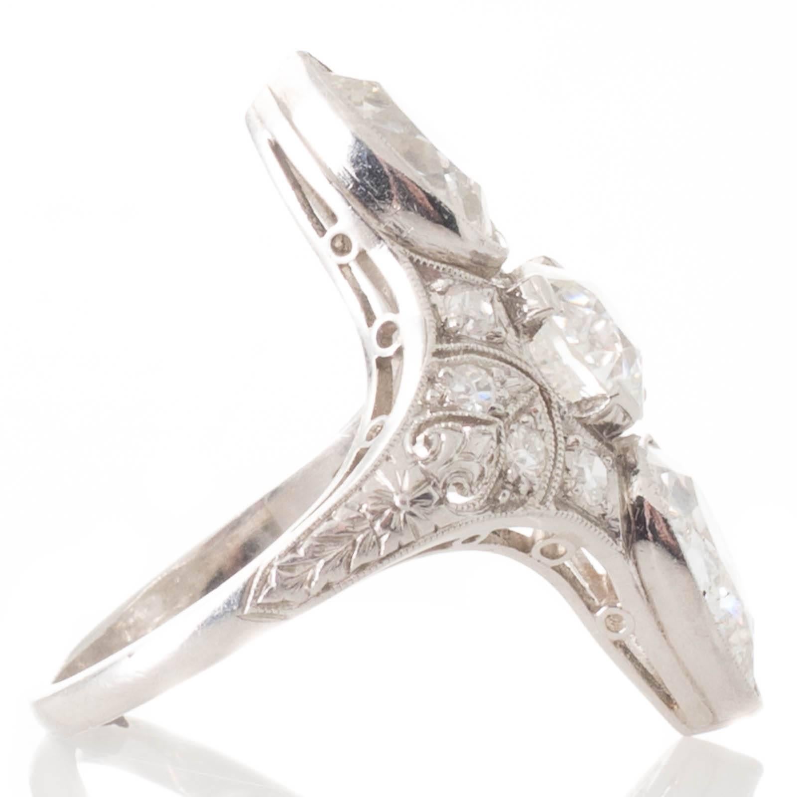 Women's Art Deco Diamond and Platinum Pear Cut Transition Cut Cocktail Ring For Sale