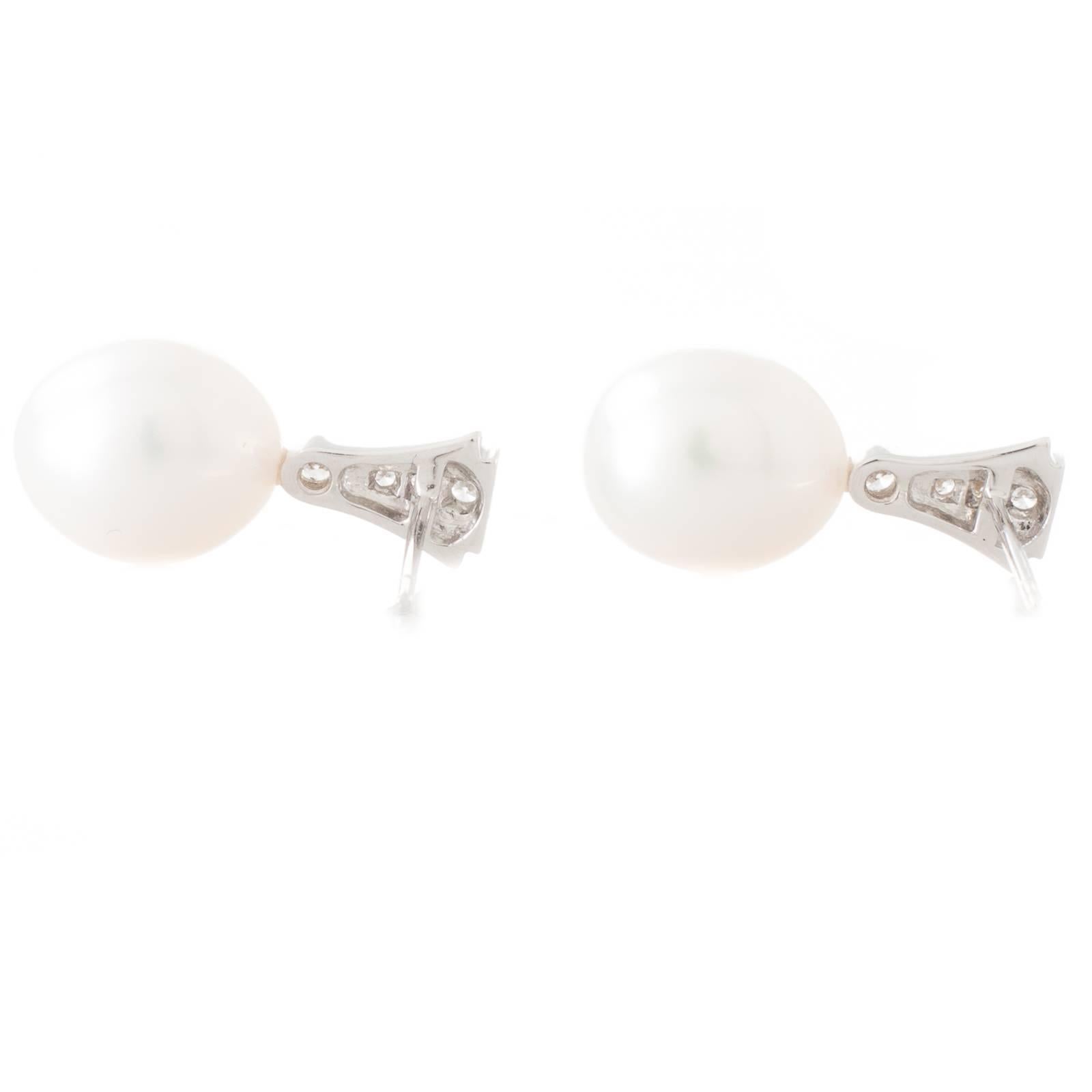 Art Deco White South Sea Oval Shaped Pearl Diamond Earrings For Sale