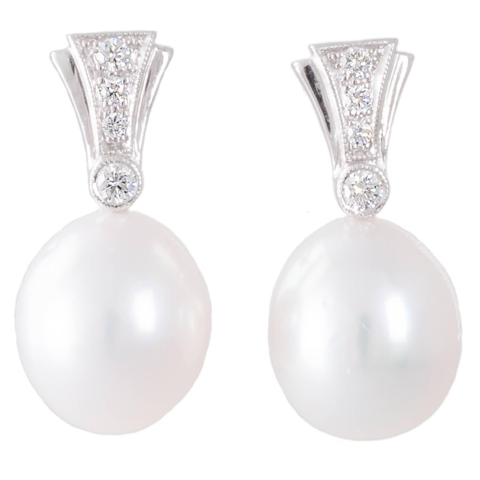 White South Sea Oval Shaped Pearl Diamond Earrings For Sale