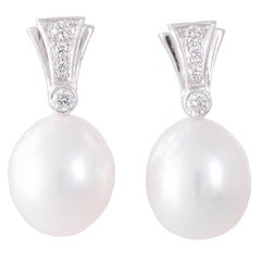 White South Sea Oval Shaped Pearl Diamond Earrings
