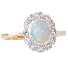 Antique Opal and Diamond Cluster Ring in Platinum and Gold