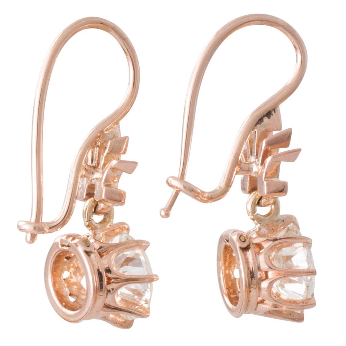 coach cover earrings