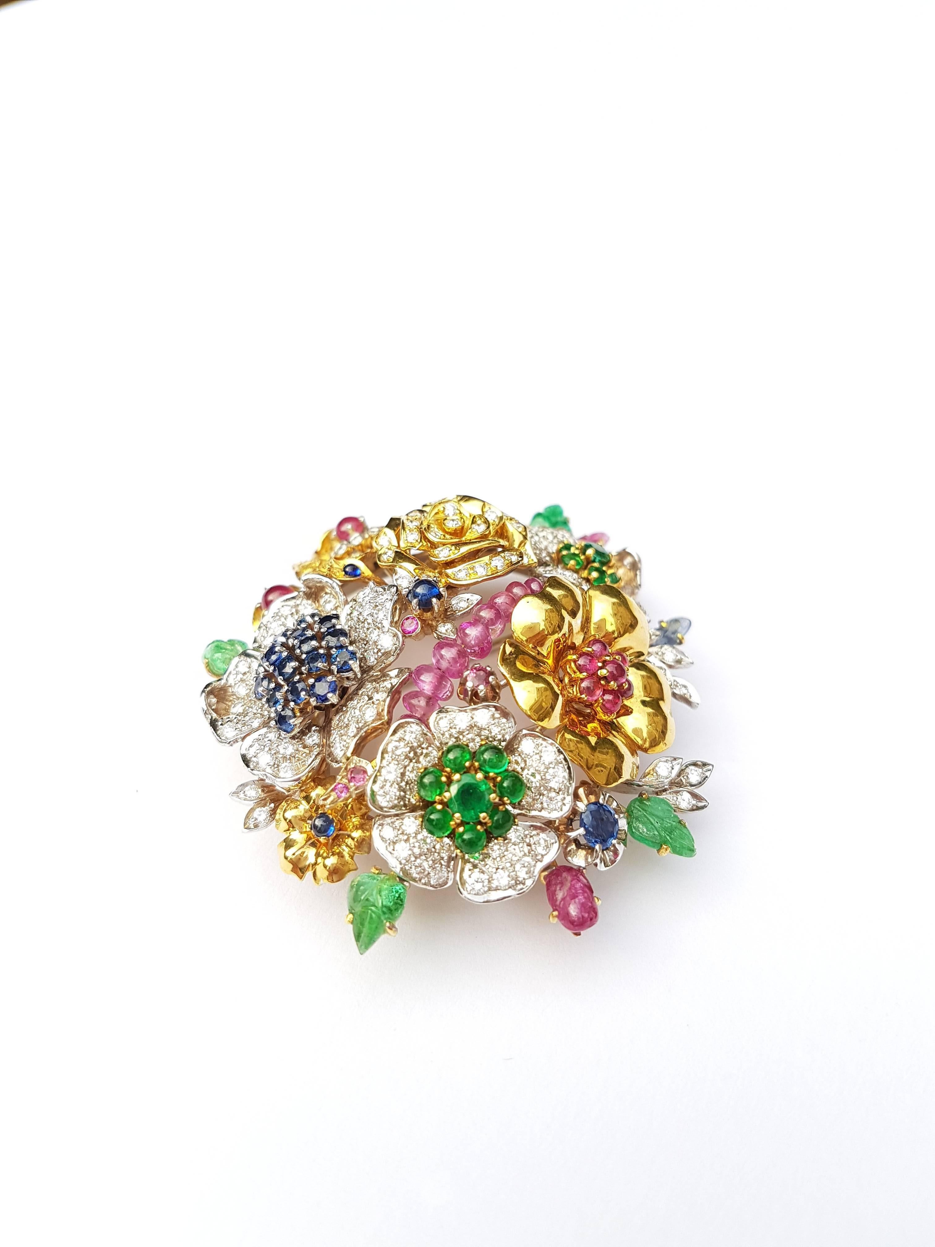  Stunningly Detailed Missiaglia Flower Brooch completely handmade by Venetian Goldsmiths in 18k Yellow and White gold with 2.88 Carats of Sapphires , 1.75 Carats of Emeralds , 3.20 Carats of Diamonds and 1.90 Carats of Pink Rubies.