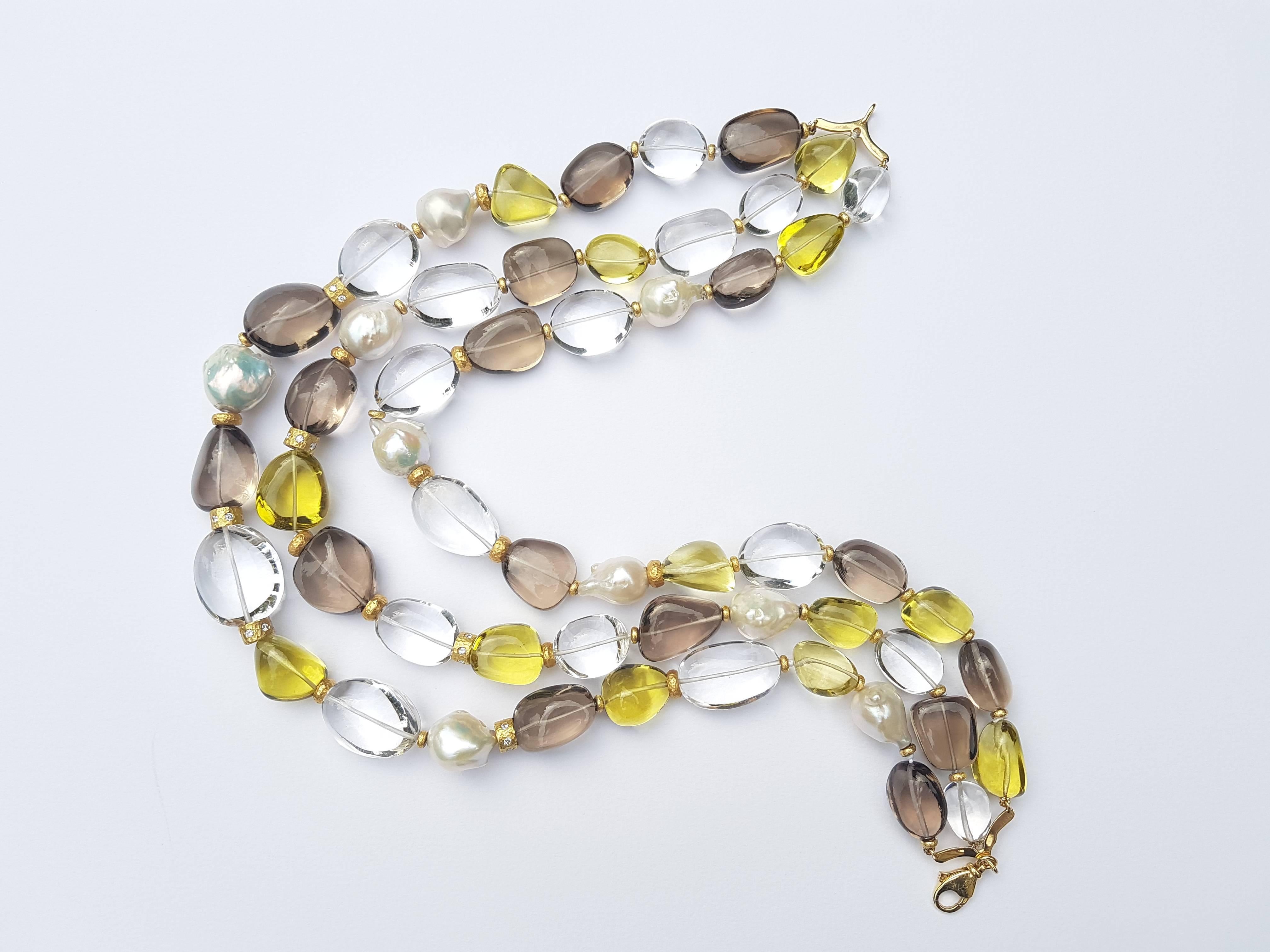 Beautiful Statement three-strand necklace in 18kt yellow Gold and 1.25 carats of Diamonds with amazing hand cut Lemon Topaz , Rock Crystal and Smoky Quartz .