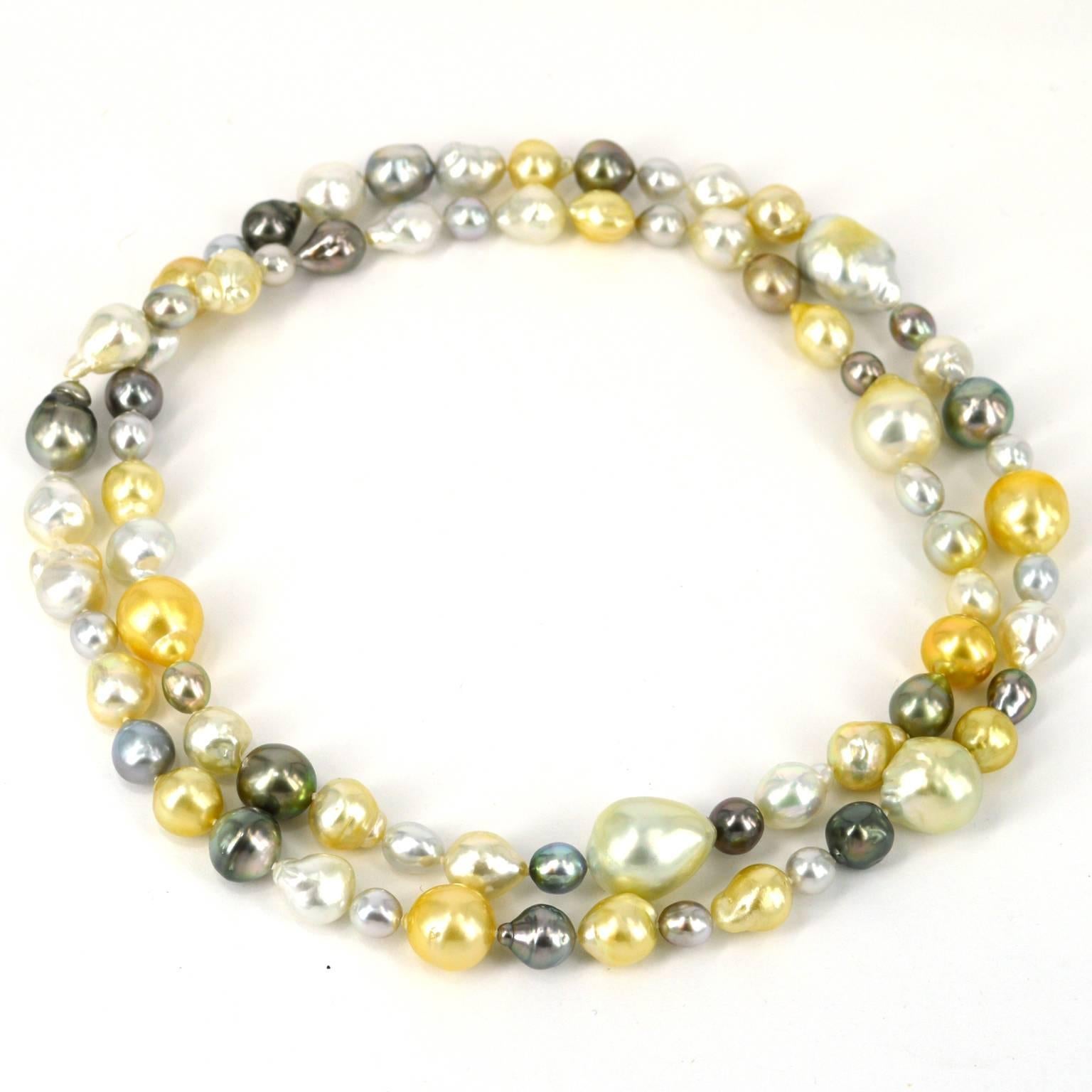 Adorn your neck in luxury with the soft tones of creams whites gold and greys. A mix of baroque South Sea and Tahitian Pearls ranging from 9mm to 20mm.
A long necklace 92cm in length. Hand knotted on soft grey thread.

All Pearls are natural and as