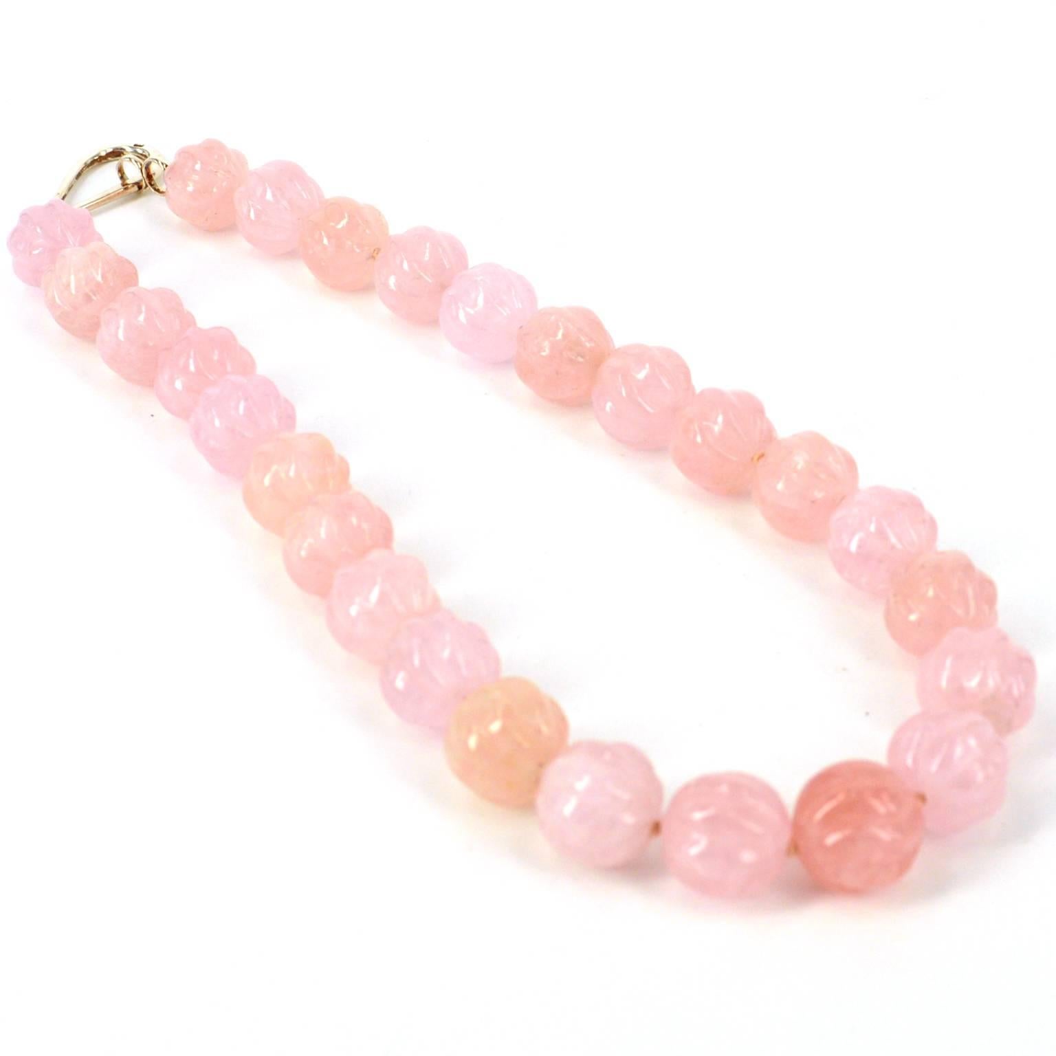 High Quality Carved 15mm Morganite beads hand knotted necklace with a stylish Sterling silver hook clasp. Finished necklace measures 48cm.