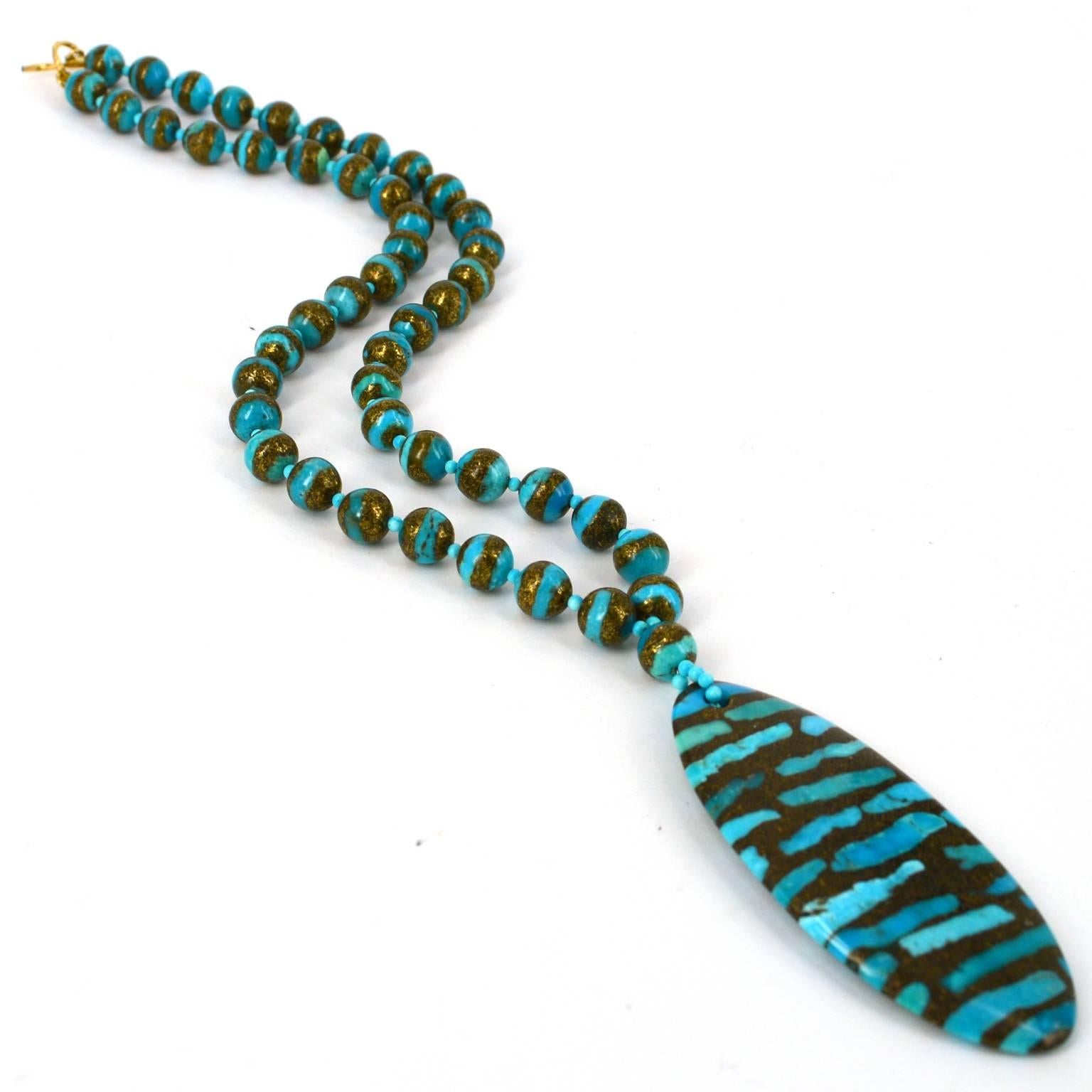 Vibrant Turquoise slices set into compressed Copper granules this necklace and earrings set makes a bold statement. 
Necklace comes with a matching pair of earrings made with 14k Gold Filled findings, finished length of earrings is 25mm 
Necklace