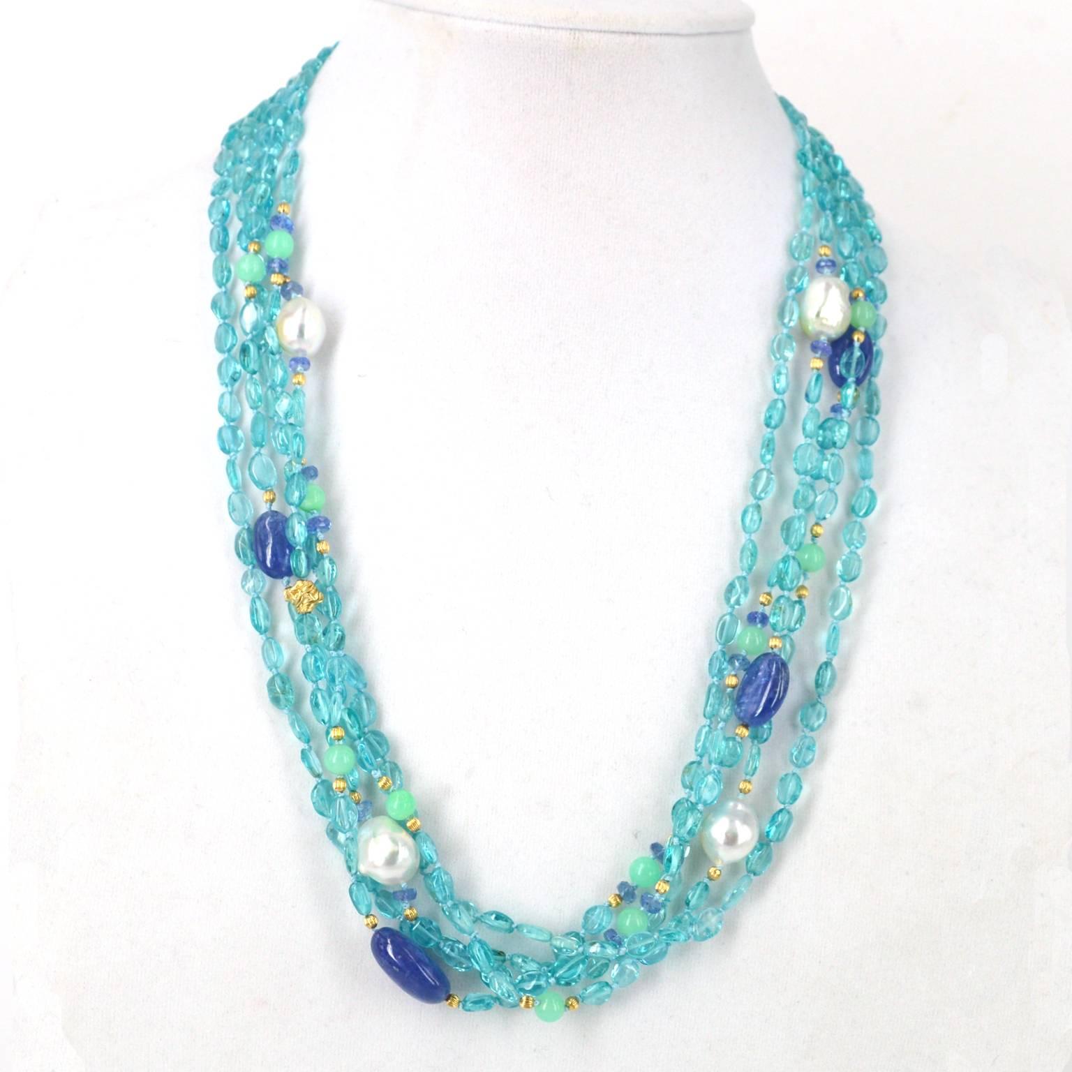 A sea of blue with 5 strands of Apatite highlighted by Tanzanite nuggets South Sea Pearls and Chrysoprase.
Tanzanite nuggets 14mm - 16mm
South Sea Pearls 14mm

Necklace measures 57cm hand knotted with a vermeil magnetic clasp

All stones and pearls