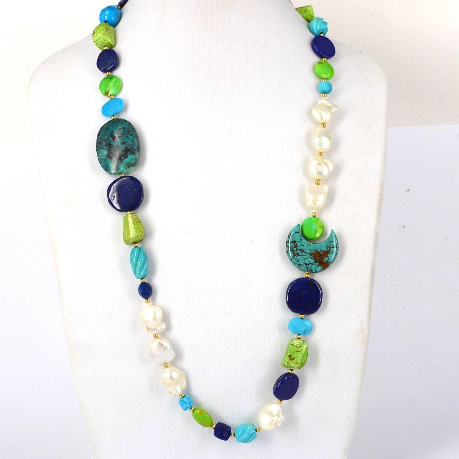 Delicious mix of green and blues highlighted with Fresh Water Keshi Pearls and 14k Gold filled beads. Lapis Lazuli beads are all natural colour and a mix of polished and faceted finish, large polished oval natural Chrysocolla 33x25mm  bead, 3/4 moon