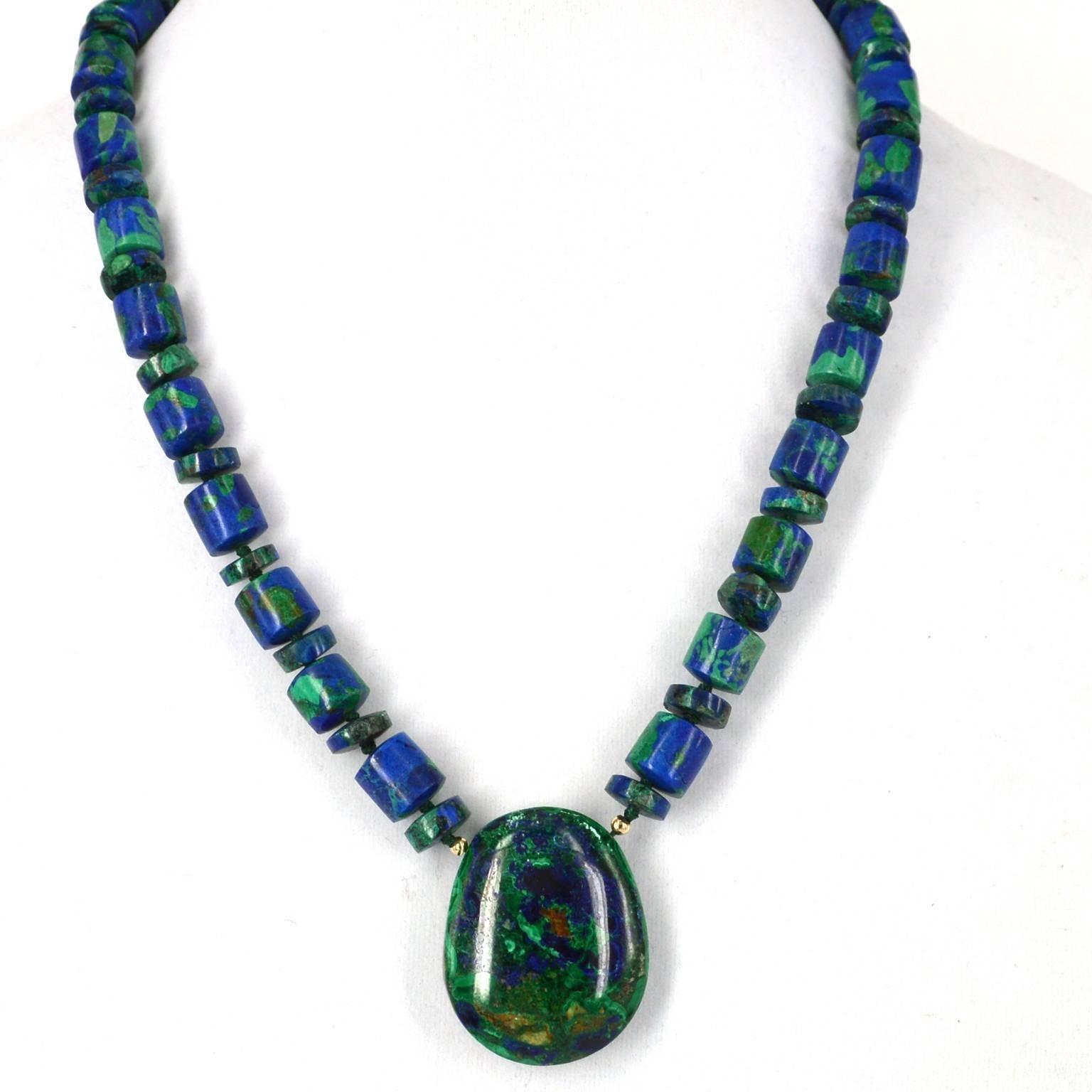 Azurite is the mingling of blue Lapis Lazuli and green Malachite and make this a stunning necklace. The main beads have been stabilised to strengthen the bead, the pendant stone has been polished only. Azurite beads are 10mm wide and the pendant is