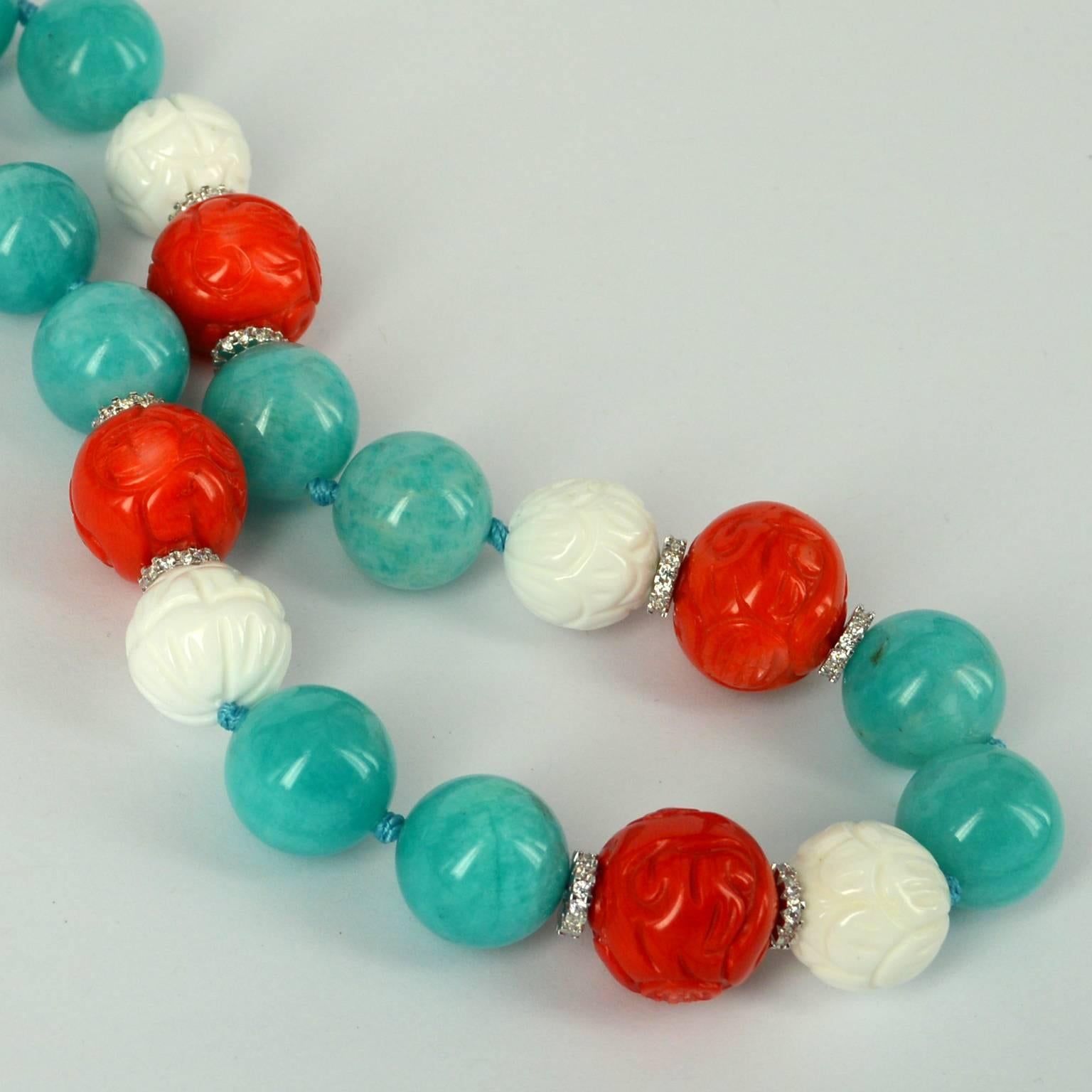 Stunning  high quality 16mm AA+ Peruvian Amazonite beads make this necklace, conbined with 17mm Carved Orange Sea Bamboo beads, which have have a Rhodium plate CZ spacer either side, and 16mm Carved white shell beads. Clasp is 16mm Sterling