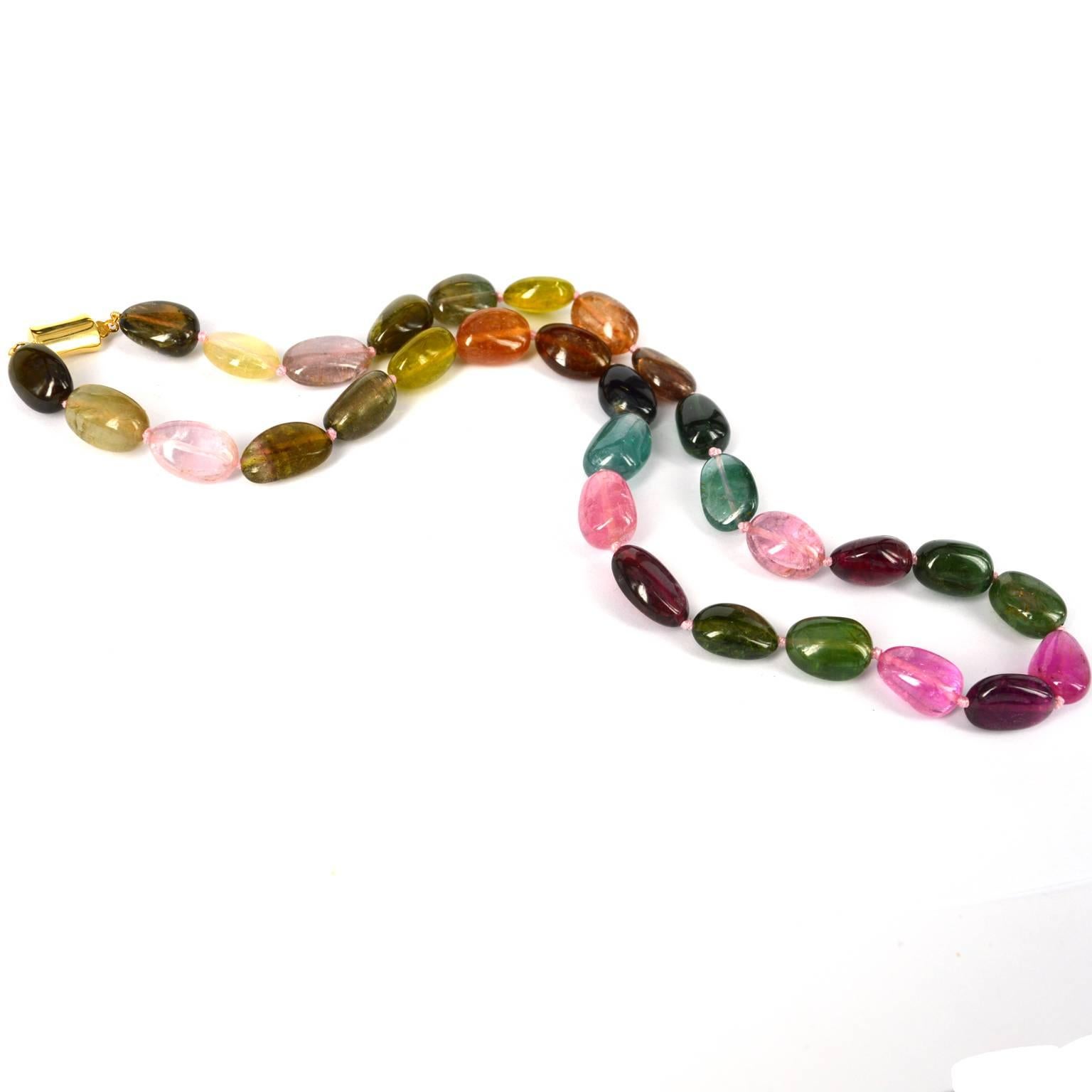 Stunning large natural Tourmaline nugget necklace, each stone is 14-17mm by 11mm hand knotted with a 13x7mm 9ct Gold Clasp.