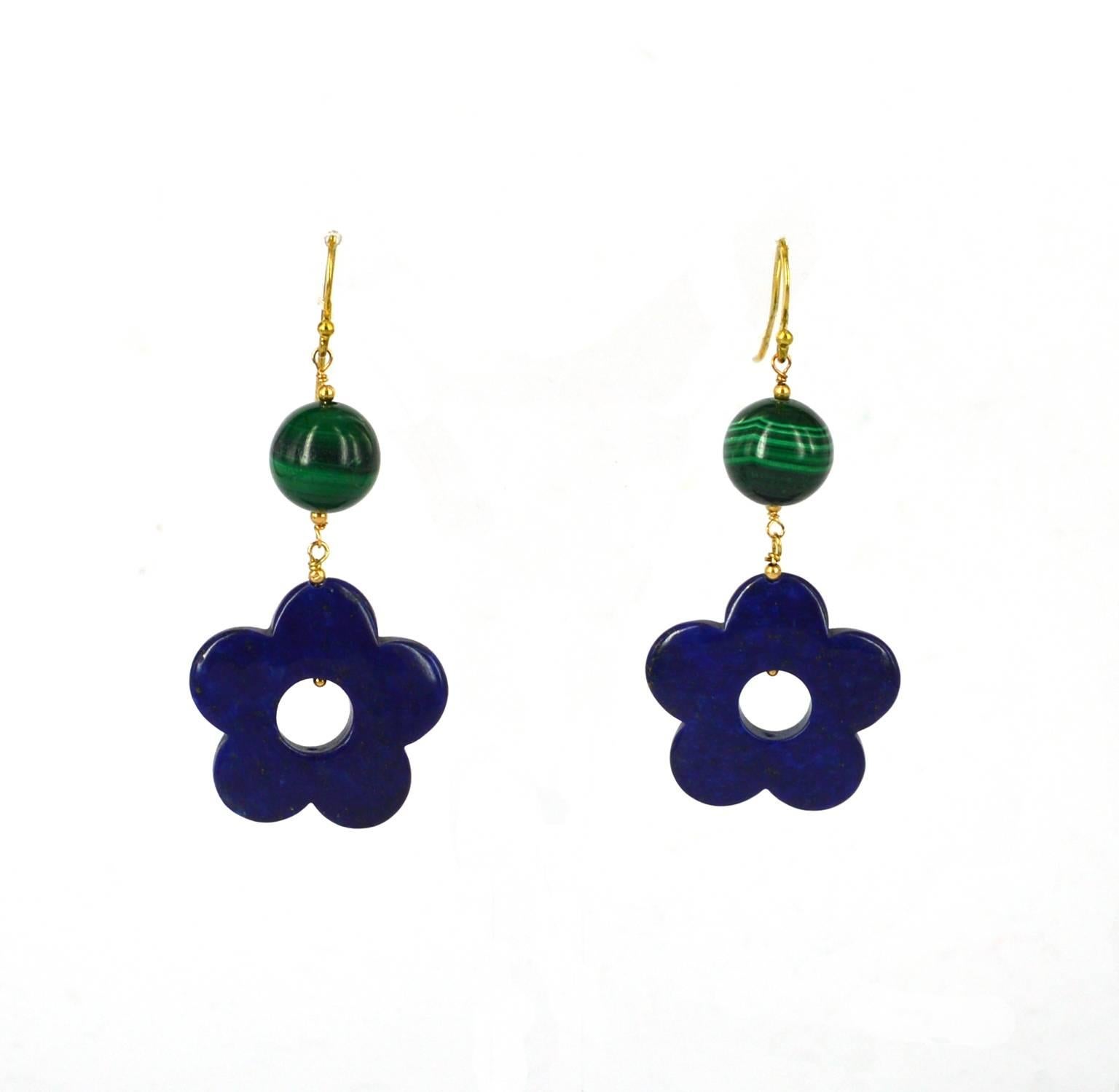 Gorgeous blue and green earrings. Natural Lapis flower bead and natural Malachite round with 14k gold filled.
Hangs 6cm

28mm lapis flower bead
12mm polished malachite bead

All gemstone are natural and have natural inclusions.