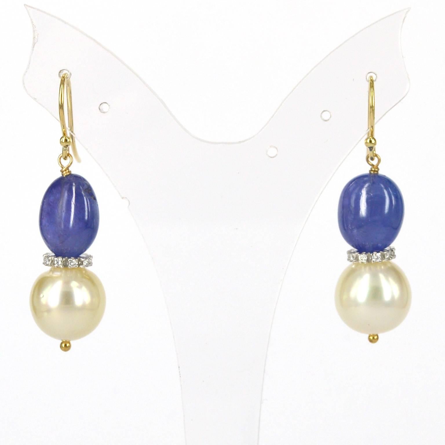 14k Gold Earrings with beautiful matching Tanzanite nuggets and round South Sea Pearls.
Pearls measure 12.2 and 12.6mm
Tanzanite nuggets measure 10x13mm
14k white Gold and diamond roundel beads with 10 x 1 pointer diamonds in each.
Total length of