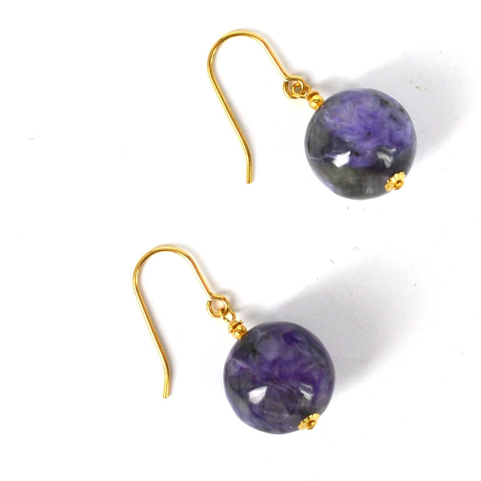 Purple Charoite 14mm beads with 14k Gold Filled findings, much brighter than the image shows.
earrings fall 32mm from the ear.