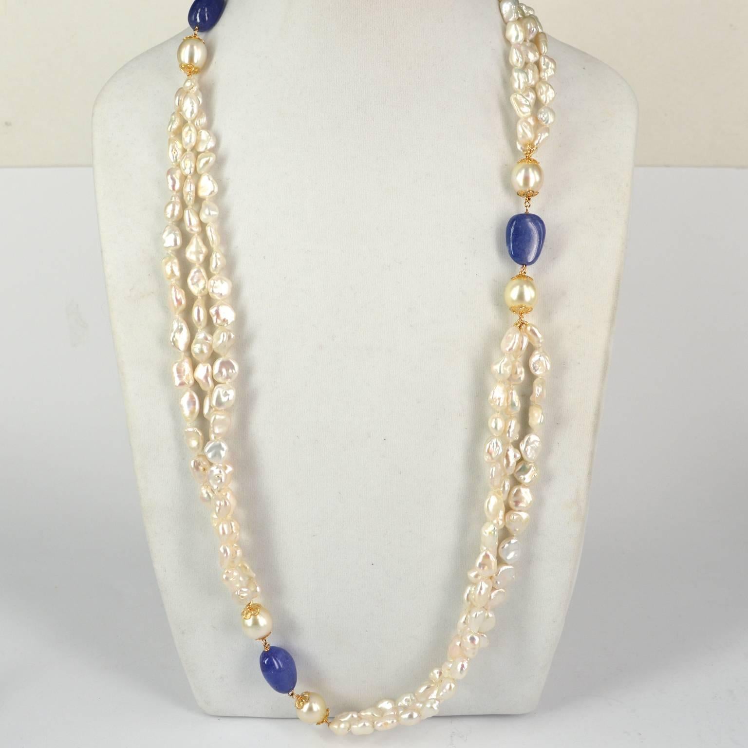 Beautiful necklace made with from 6 stunning 12mm South Sea Pearls, 3 x 20-22x13-15mm Tanzanite nuggets and connected with 3 strands of 10x8mm Baroque Keshi Fresh Water Pearls, each strand of Keshi Pearls measures 21mm long and has been hand