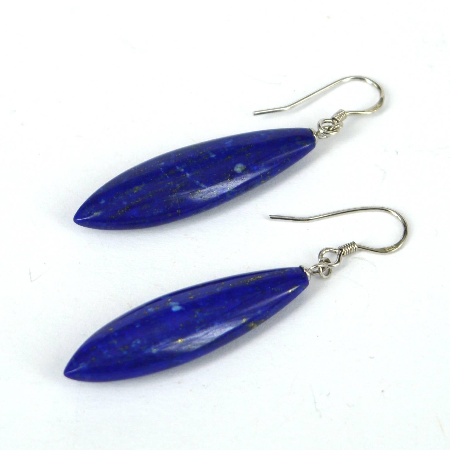 Polished Lapis Lazuli in a marquise shape. Sterling Silver Rhodium plate hooks and findings.
52mm long drop. 10mm x 35mm bead.