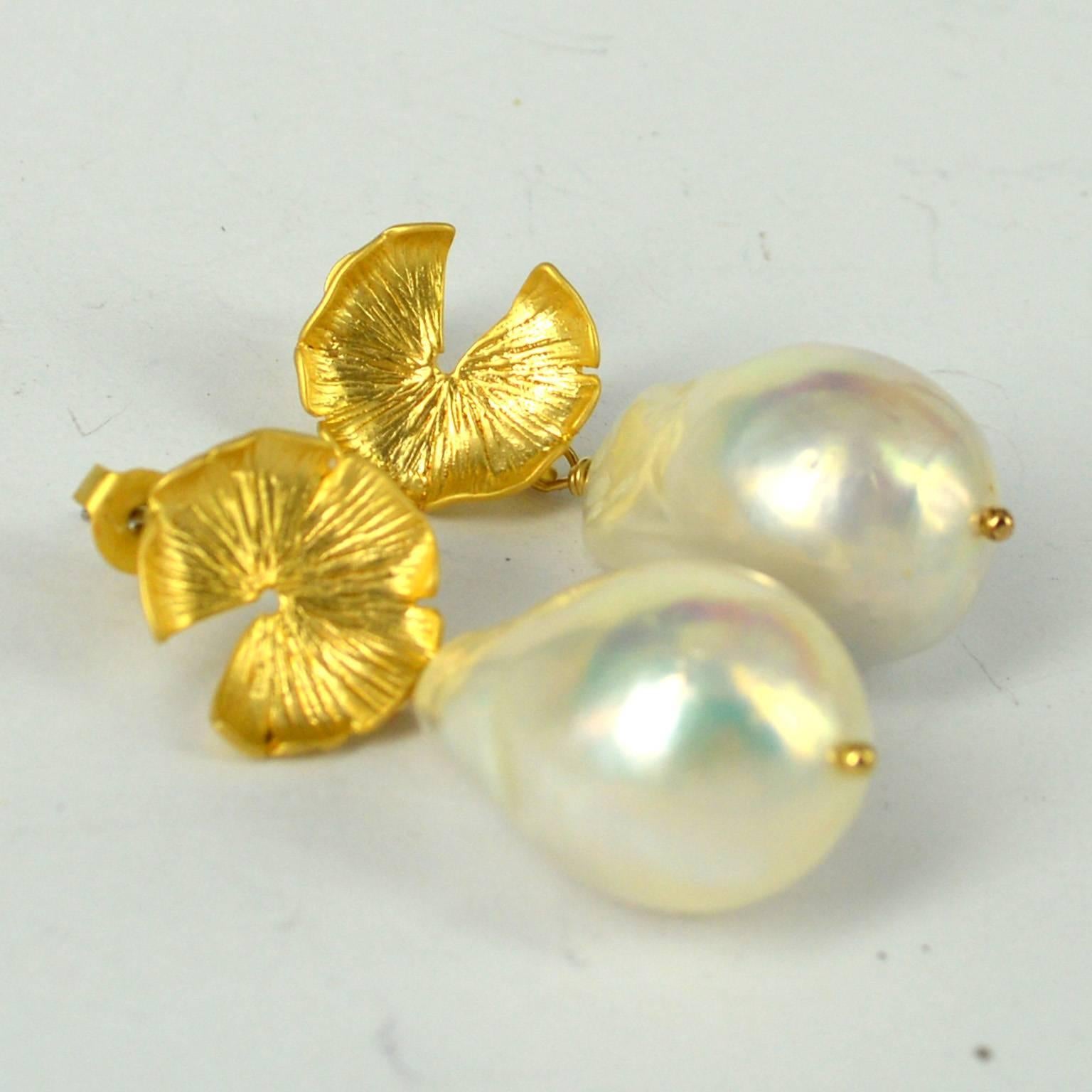 Luscious large Baroque Fresh Water Pearls 20x14mm with a Gold plate stud, post that goes through the ear is Gold plate Sterling Silver, head pins are 14k Gold Filled.
length of Earrings from the post is 35mm 
