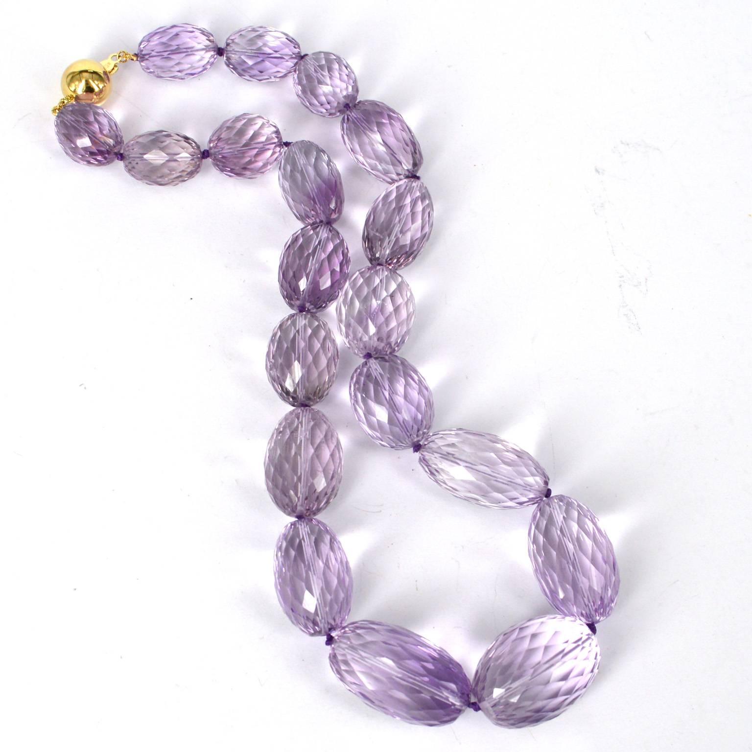  Finest quality large graduating faceted Pink Amethyst stones sizes from 16x13mm up to 28x20mm hand knotted on purple thread for strength and durability with 12mm 9k Gold clasp.
Finished necklace measures 47.5mm