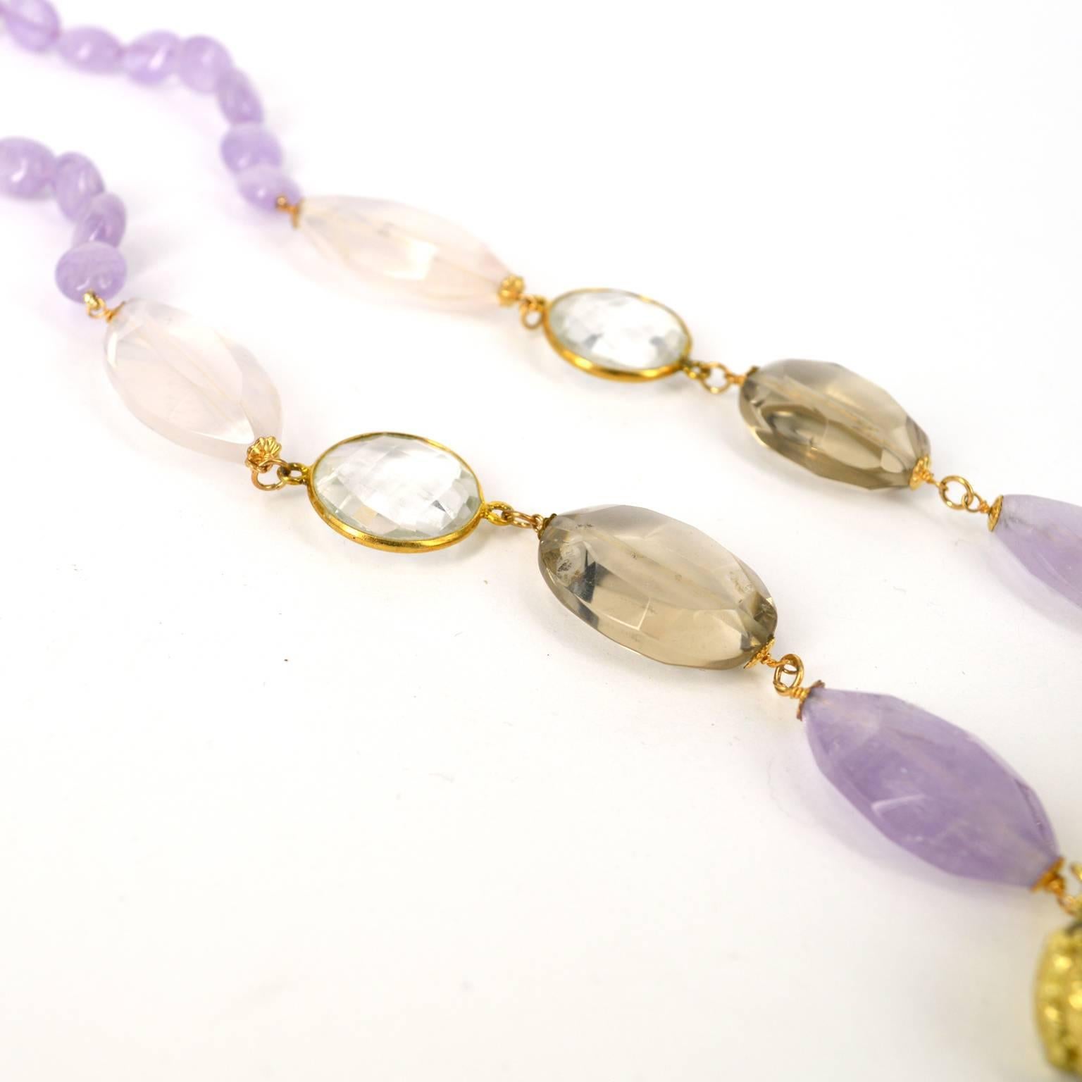 Statement natural Druzy Agate pendant with a gold colour surround is enhanced with soft natural Cape Amethyst 26mm and Rose Quartz 30mm faceted Ellipse Beads. 14k Gold filled wire and caps with hand wire wraps connect to light Smokey Quartz 23mm