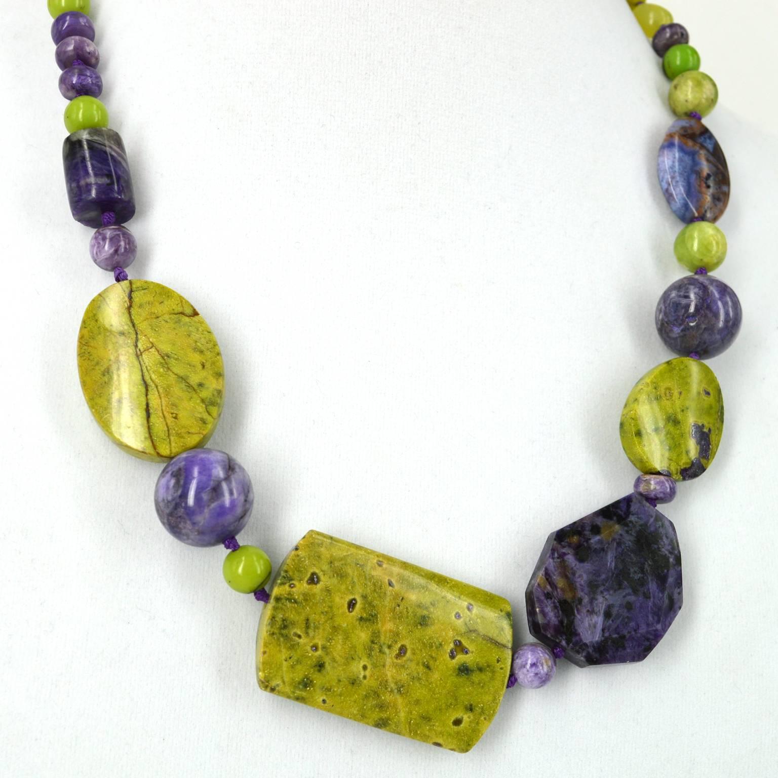 Stitchite Necklace- two Rare and beautiful gemstones combine and enhance each other in this necklace.
Stitchite-is a mineral, a carbonate of chromium and magnesium that is the purple flecks found in the green Serpentine.
Stitchite is only found only