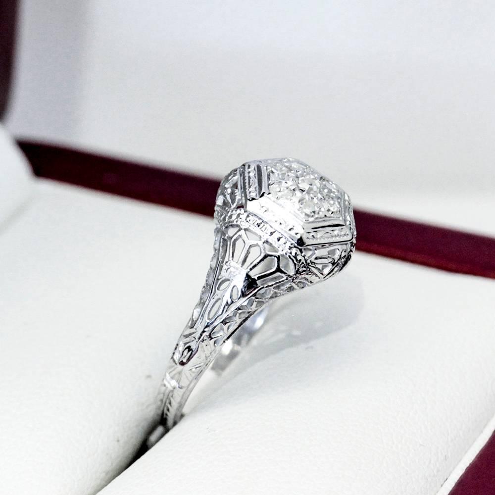 Women's Art Deco Seven Diamond White Gold Cluster Engagement Ring For Sale